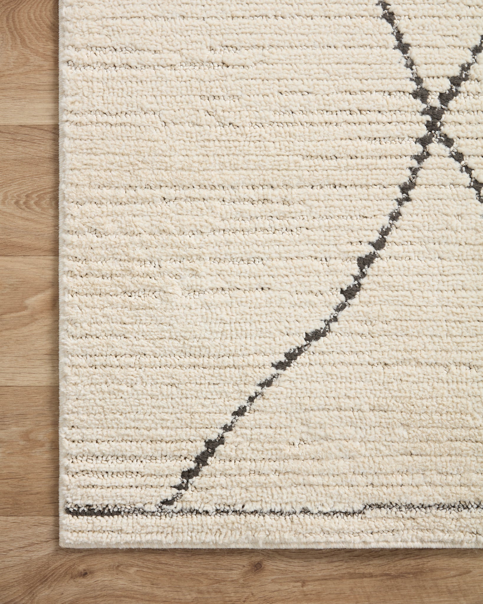 lifestyle view of Fabian Ivory / Charcoal luxury Rug