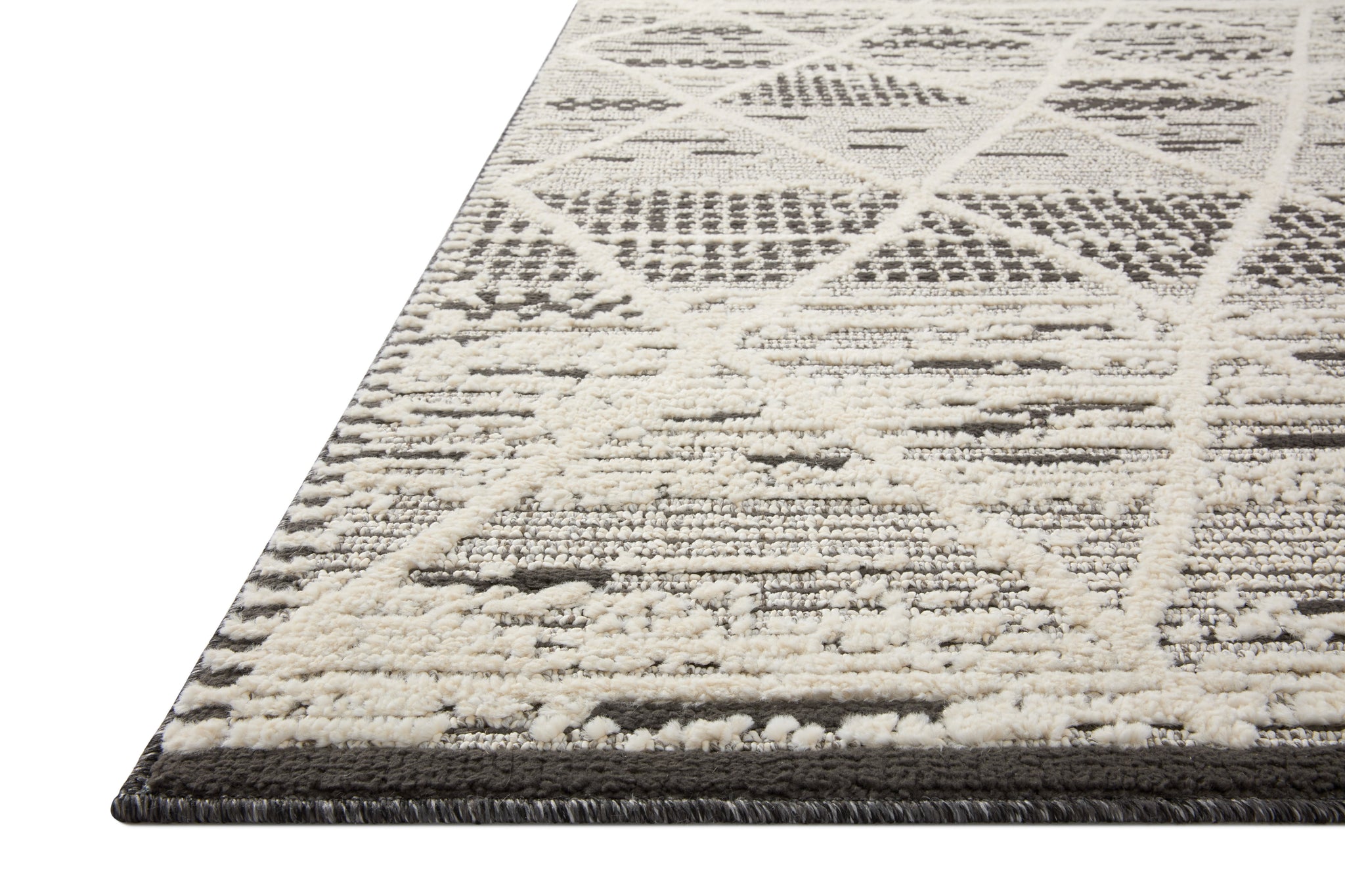 side view of Fabian Charcoal / Ivory luxury Rug