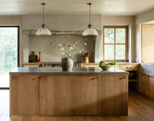 Glint Pendant 16.75" styled in a bright kitchen for warm, layered light at Laurie Yapp Home.