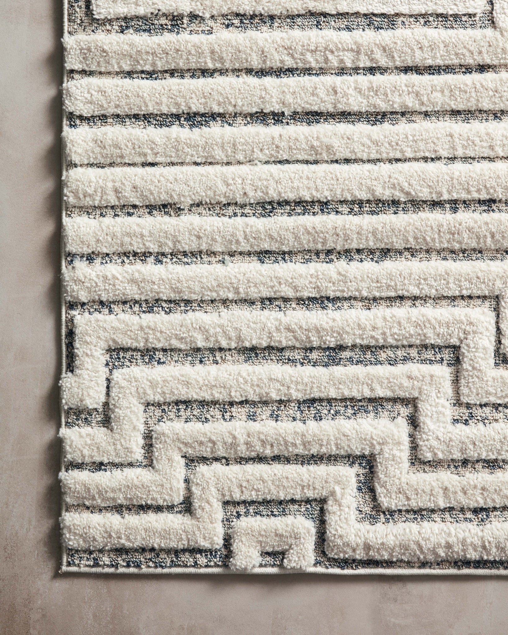 detail view of Hagen White / Sky luxury Rug