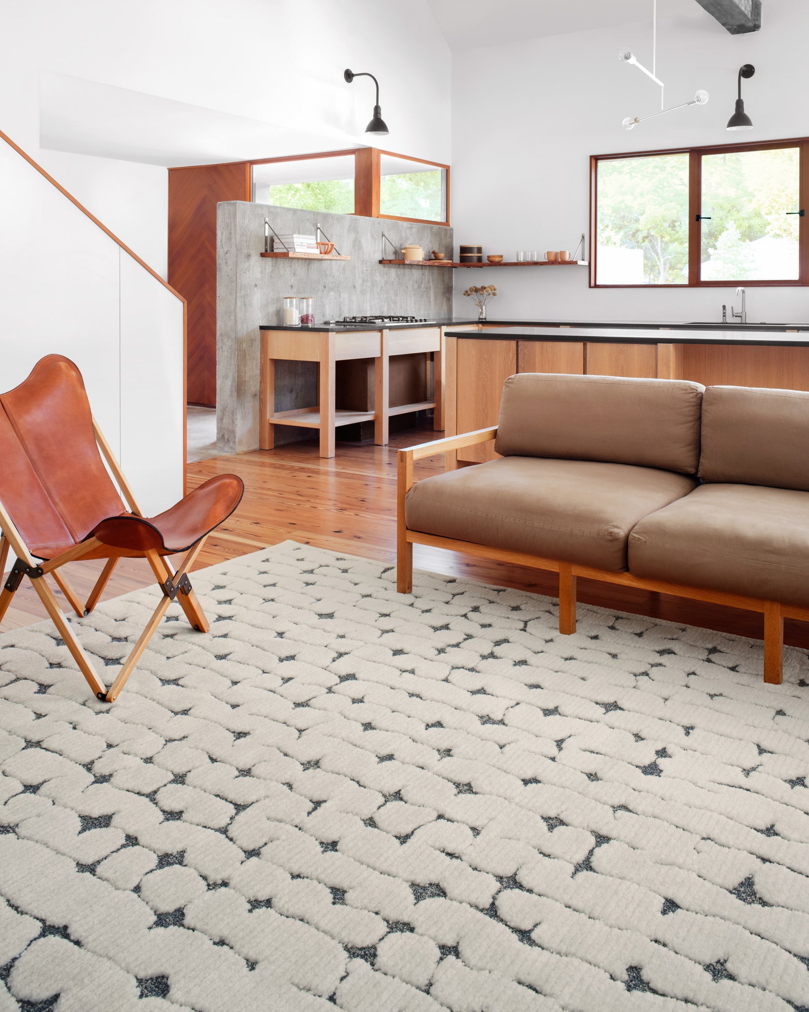 angle view of Hagen White / Navy luxury Rug
