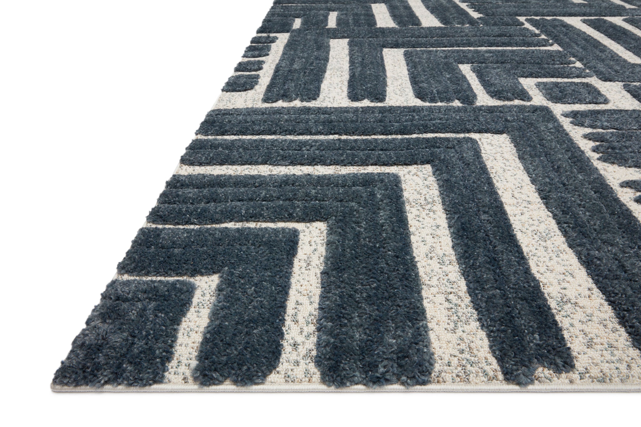 side view of Hagen Blue / White luxury Rug