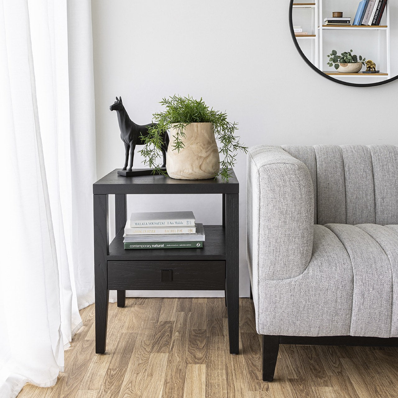 Black wooden side table on a white background