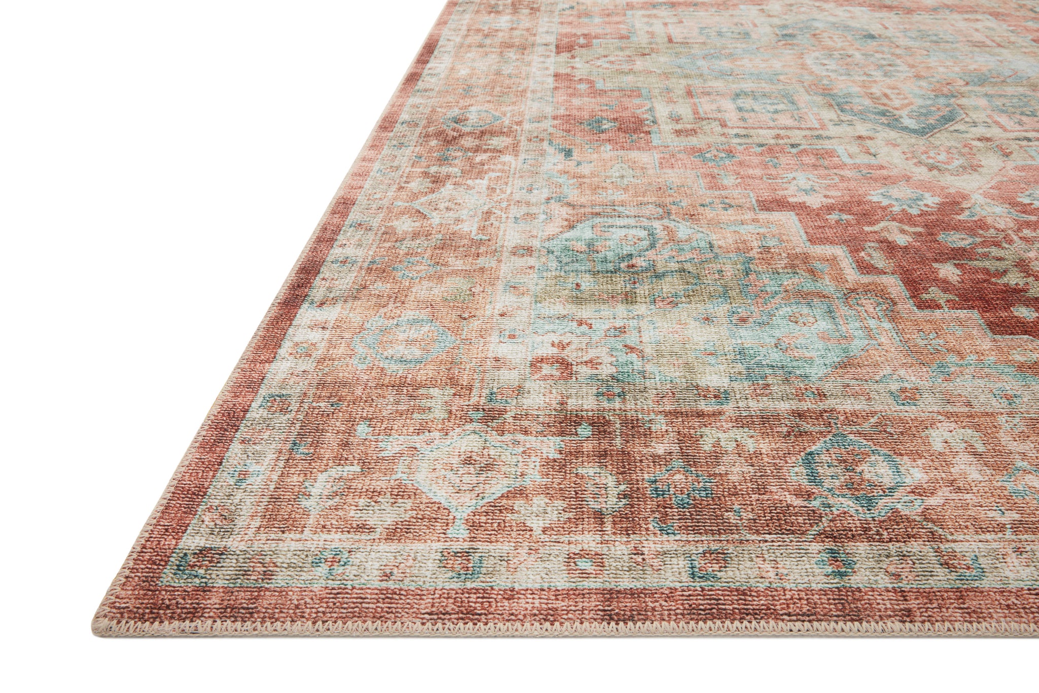 side view of Heidi Terracotta / Aqua luxury Rug