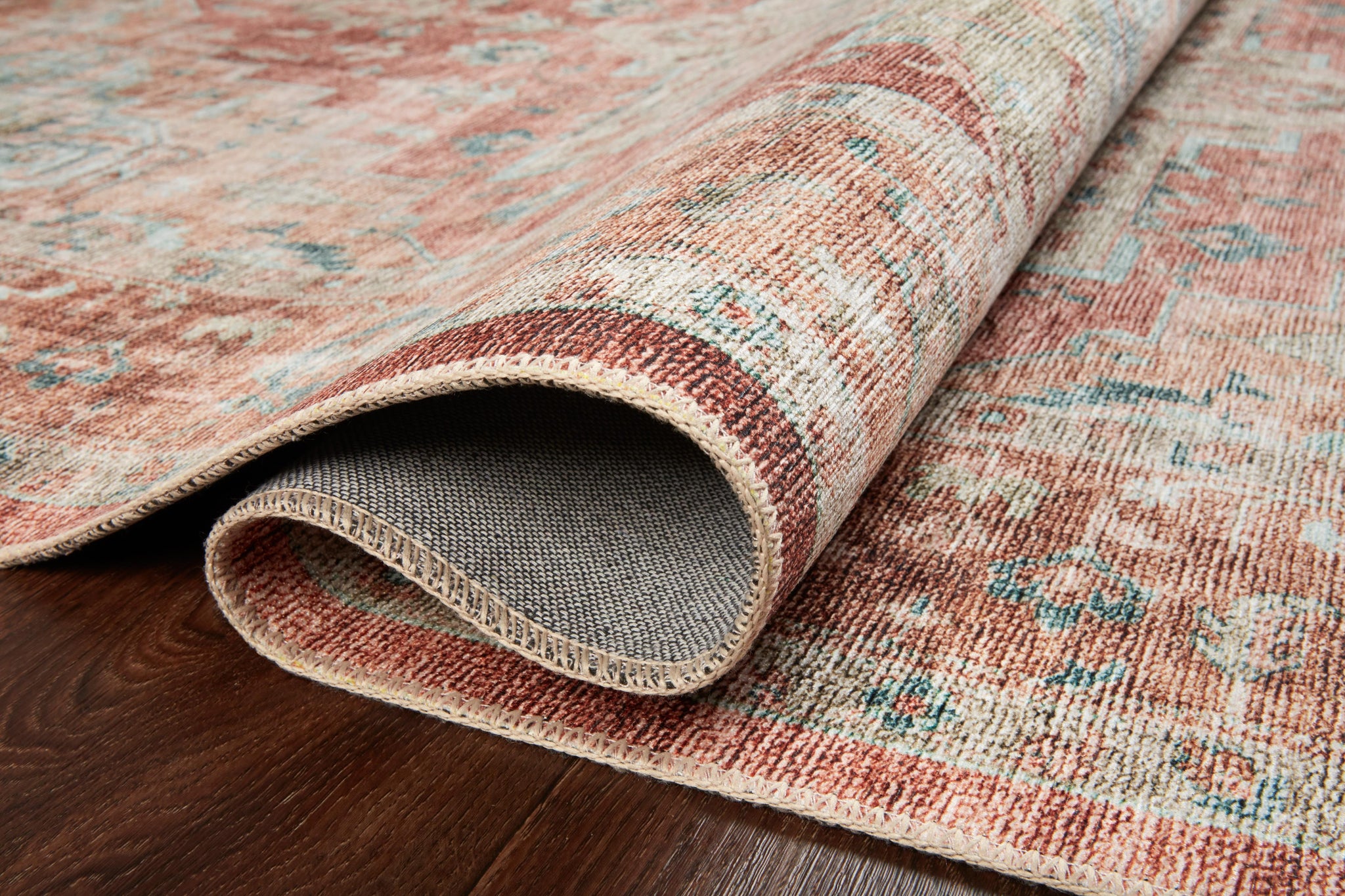 lifestyle view of Heidi Terracotta / Aqua luxury Rug