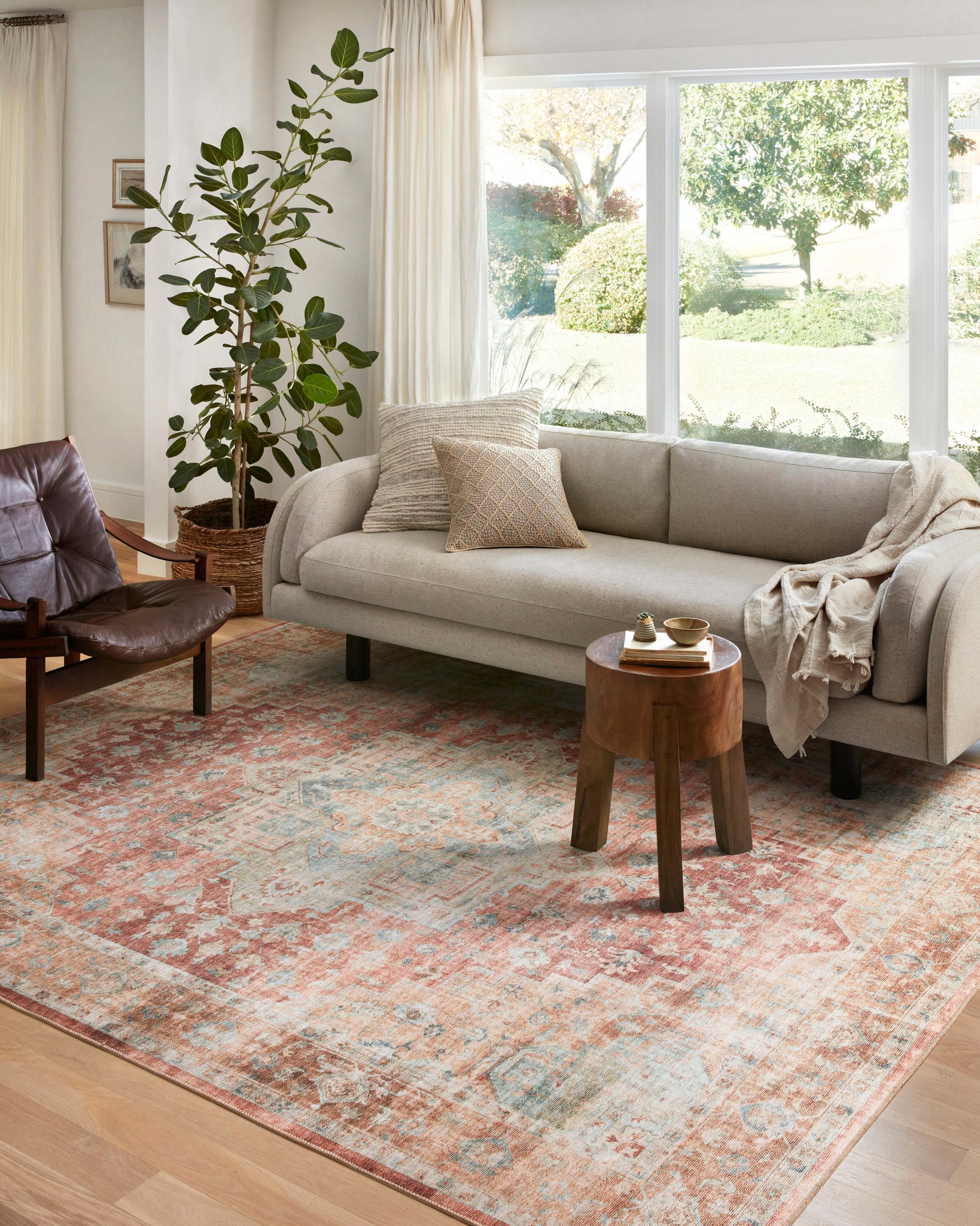 angle view of Heidi Terracotta / Aqua luxury Rug