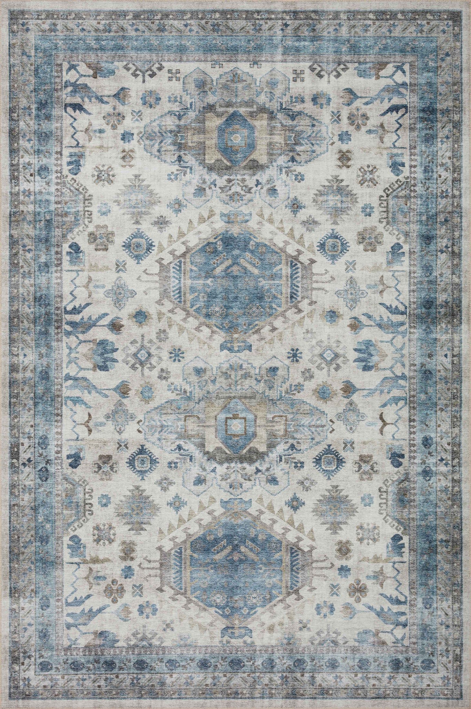 front view of Heidi Ivory / Ocean luxury Rug