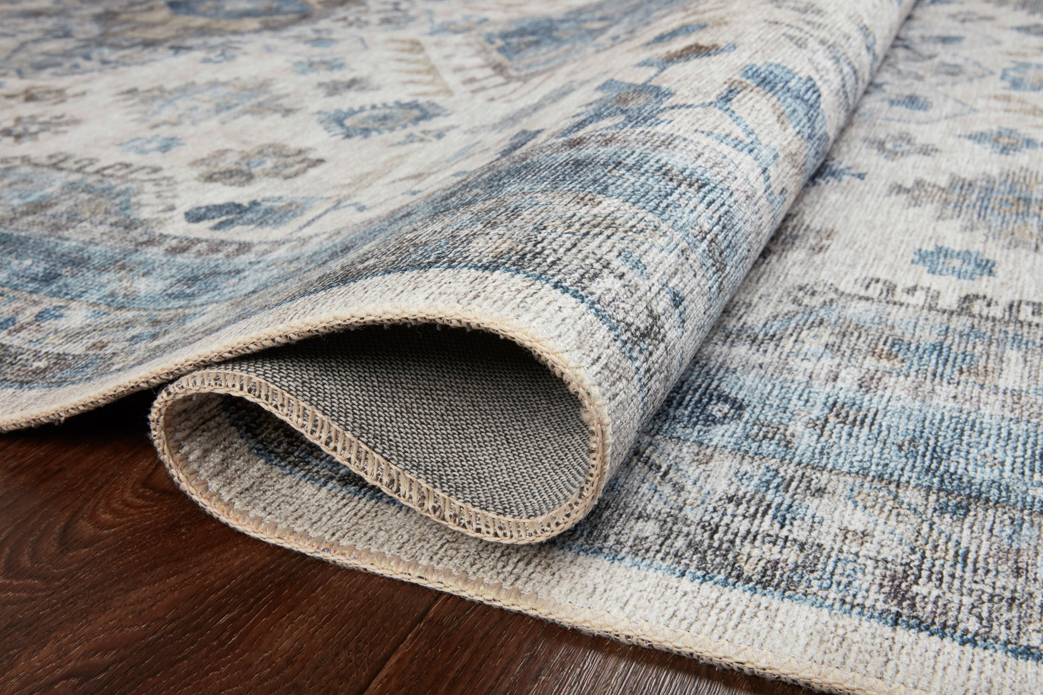 lifestyle view of Heidi Ivory / Ocean luxury Rug