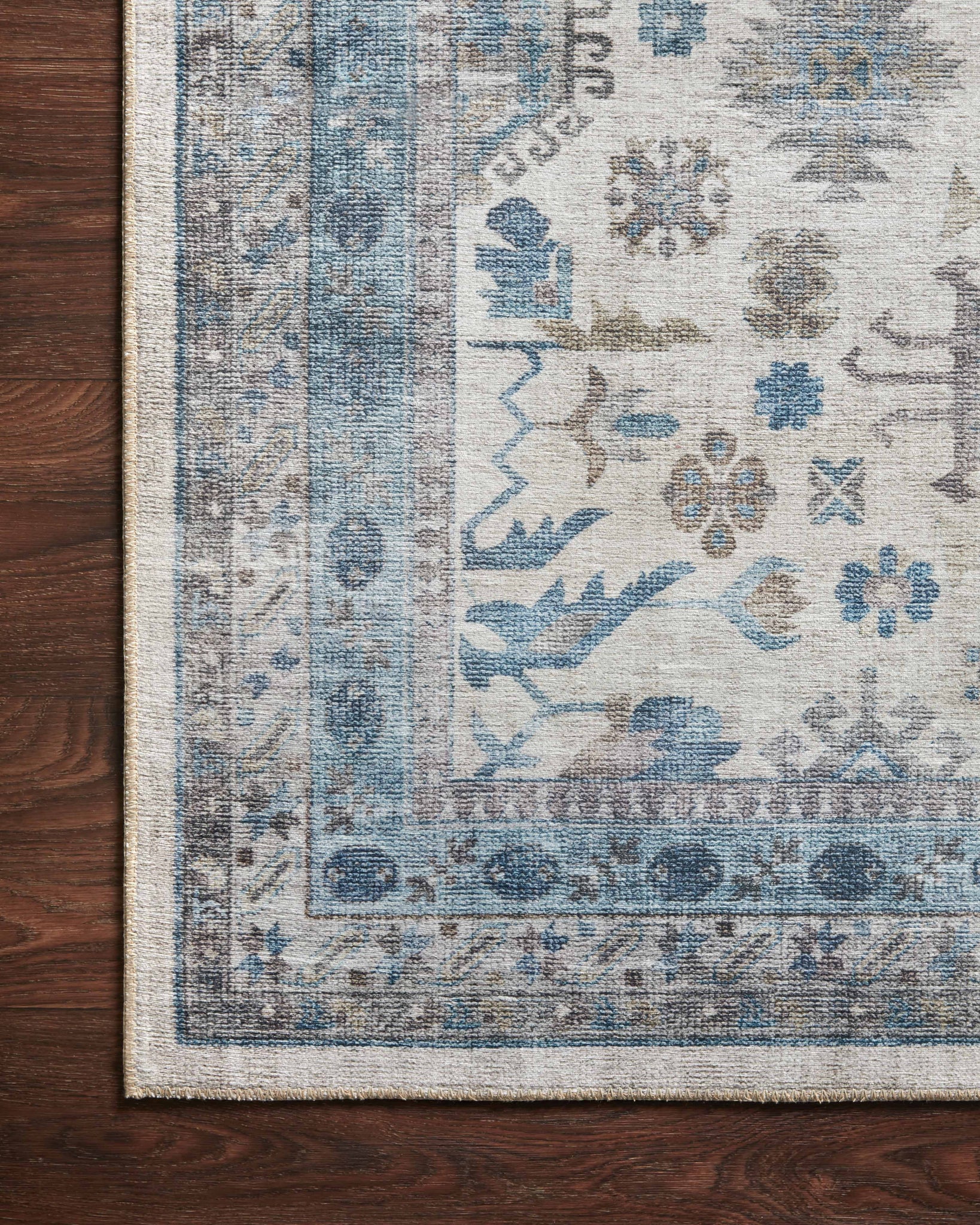 lifestyle view of Heidi Ivory / Ocean luxury Rug