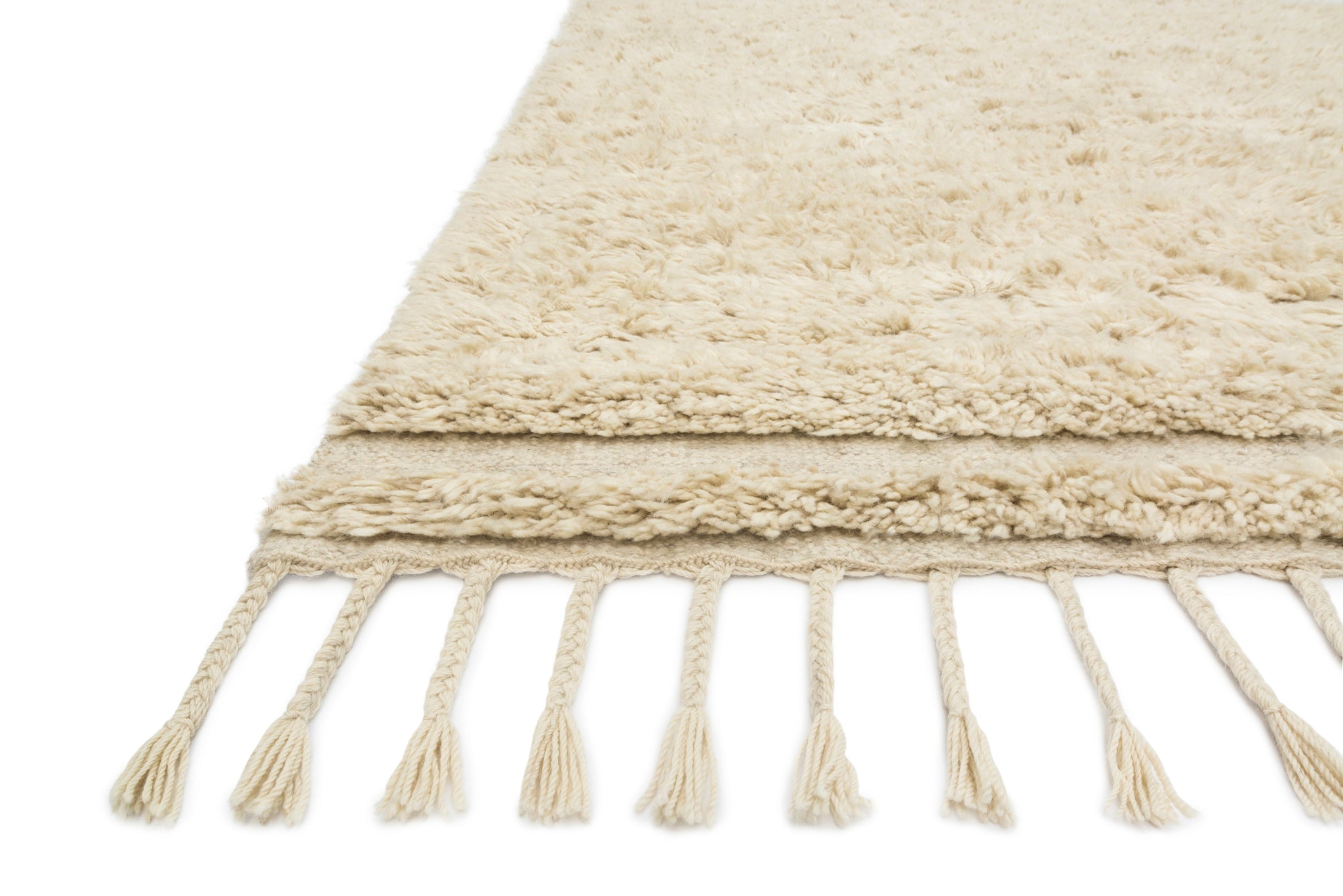 side view of Hygge Oatmeal / Sand luxury Rug
