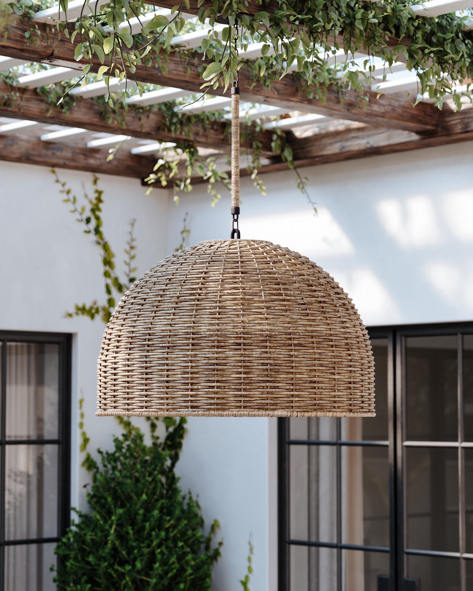 Huxley Exterior Pendant 34" styled in a bright kitchen for warm, layered light at Laurie Yapp Home.