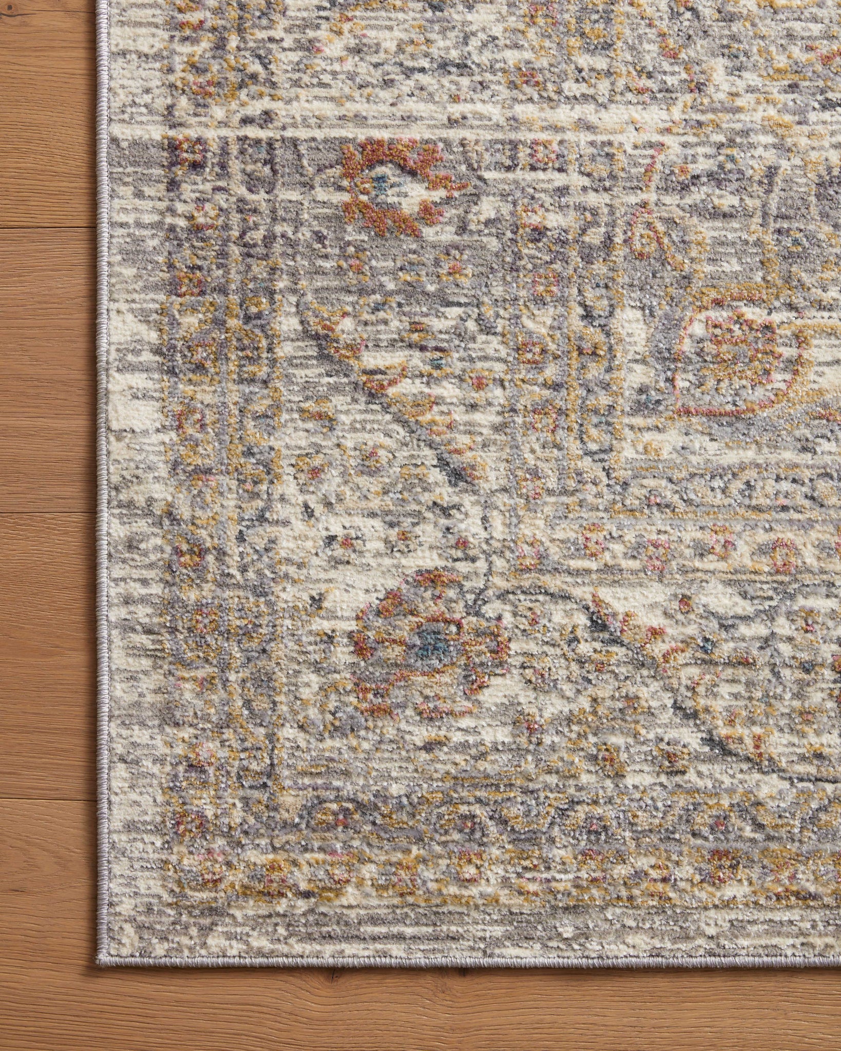 side view of Indra Stone / Multi luxury Rug