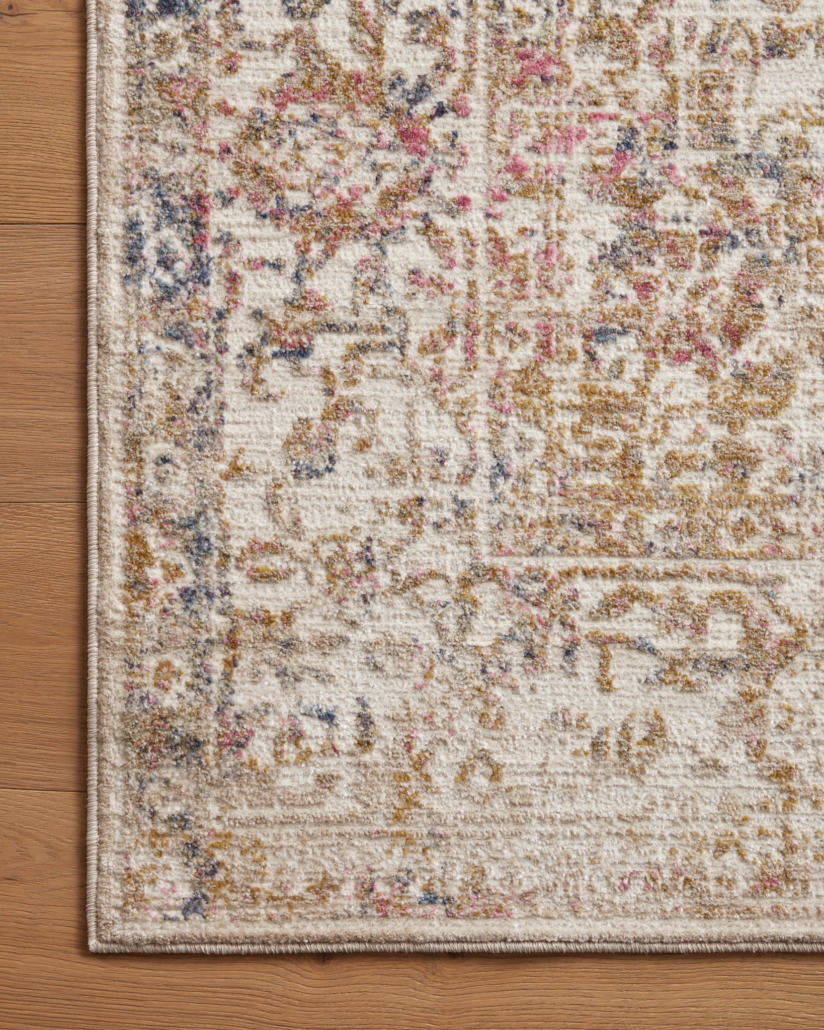 side view of Indra Ivory / Multi luxury Rug