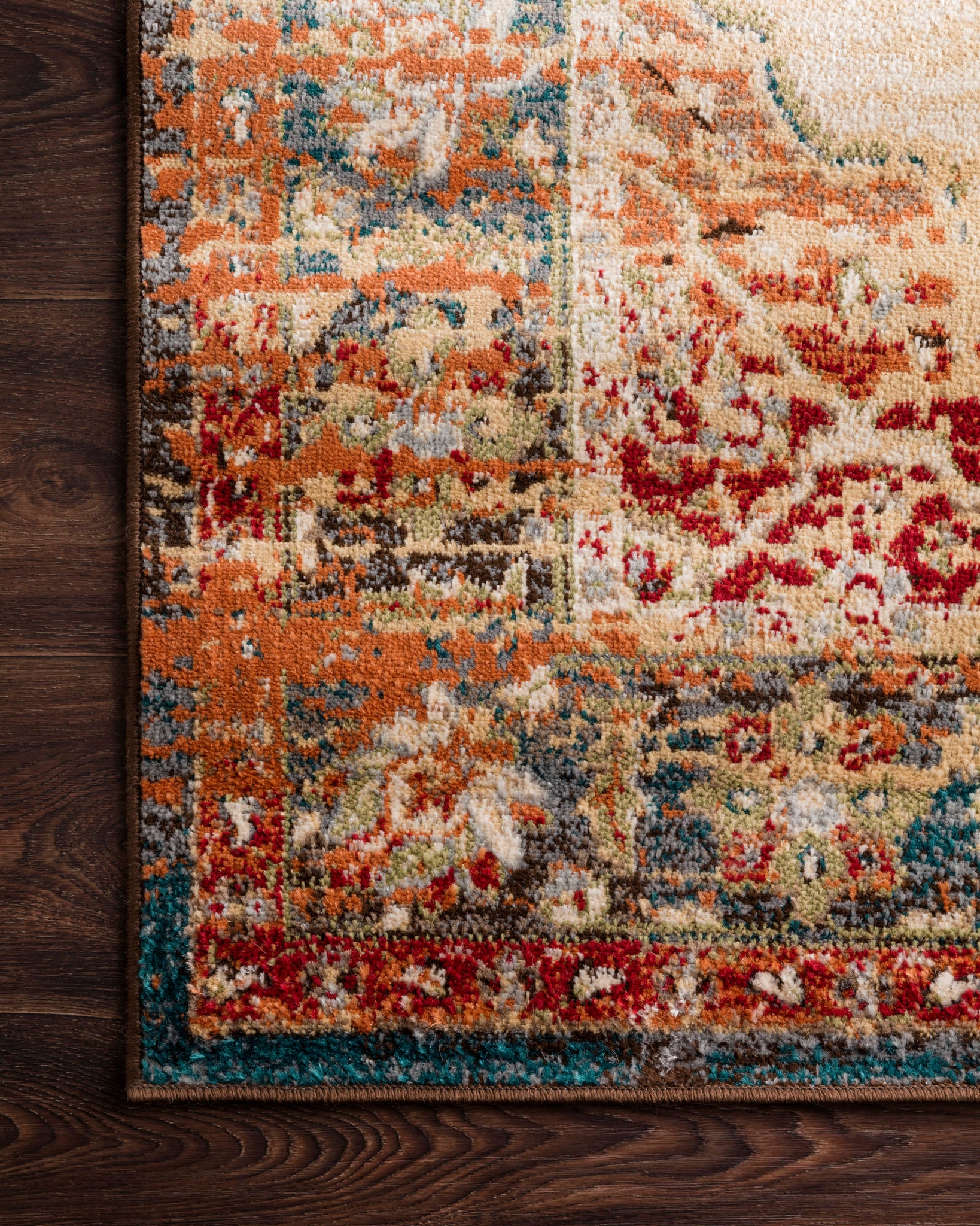 lifestyle view of Isadora Ant. Ivory / Sunset luxury Rug