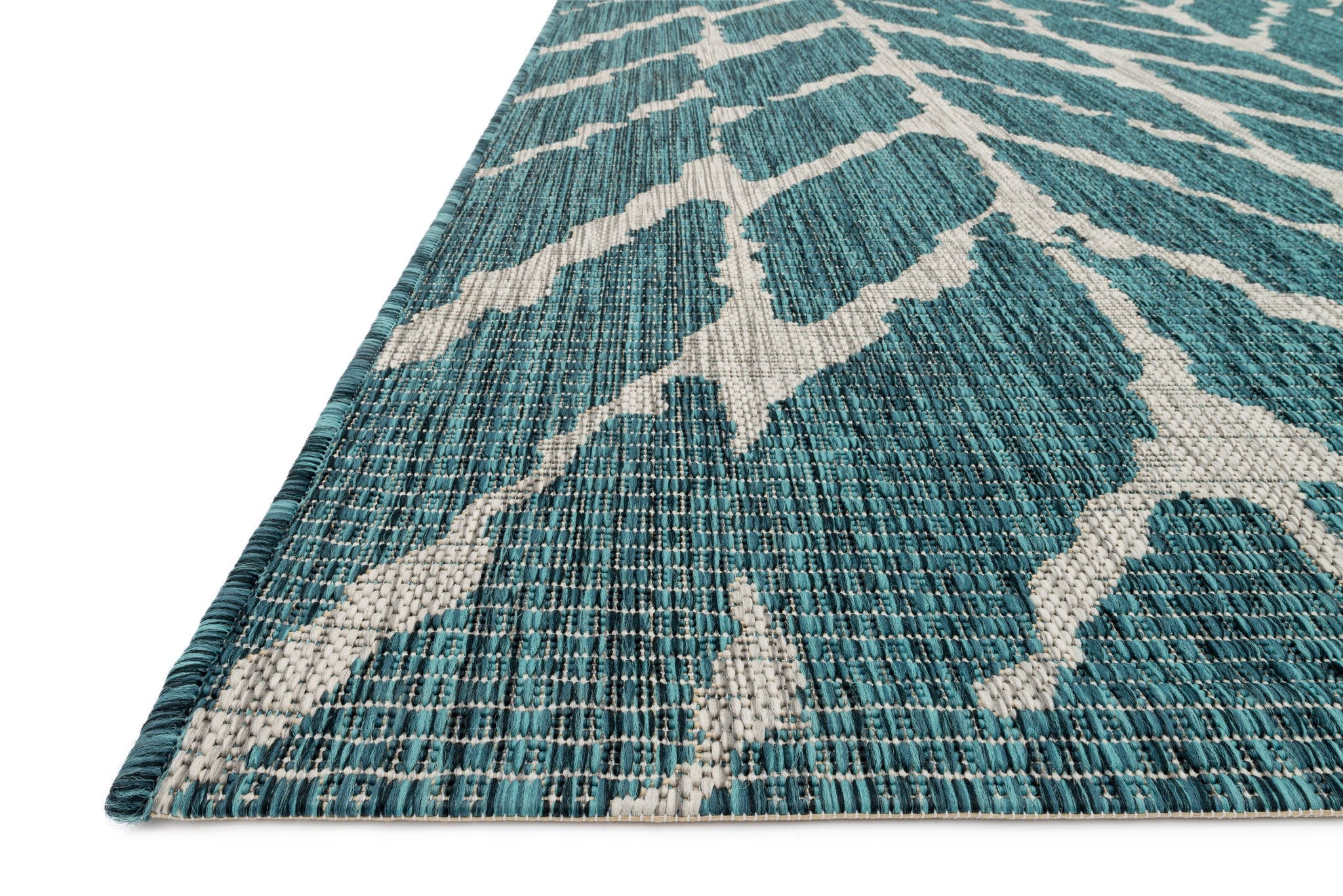 side view of Isle Teal / Grey luxury Rug