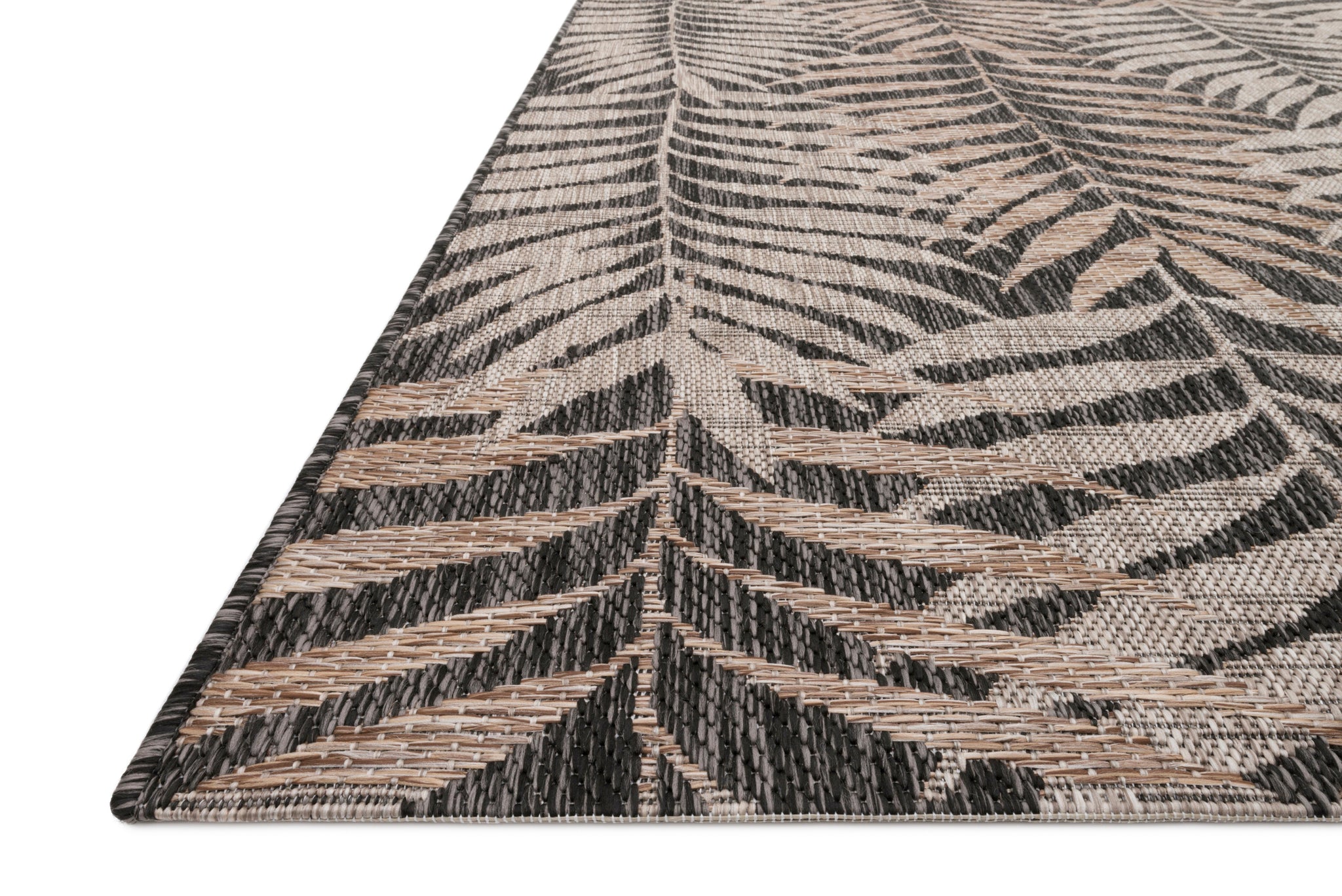 angle view of Isle Natural / Black luxury Rug