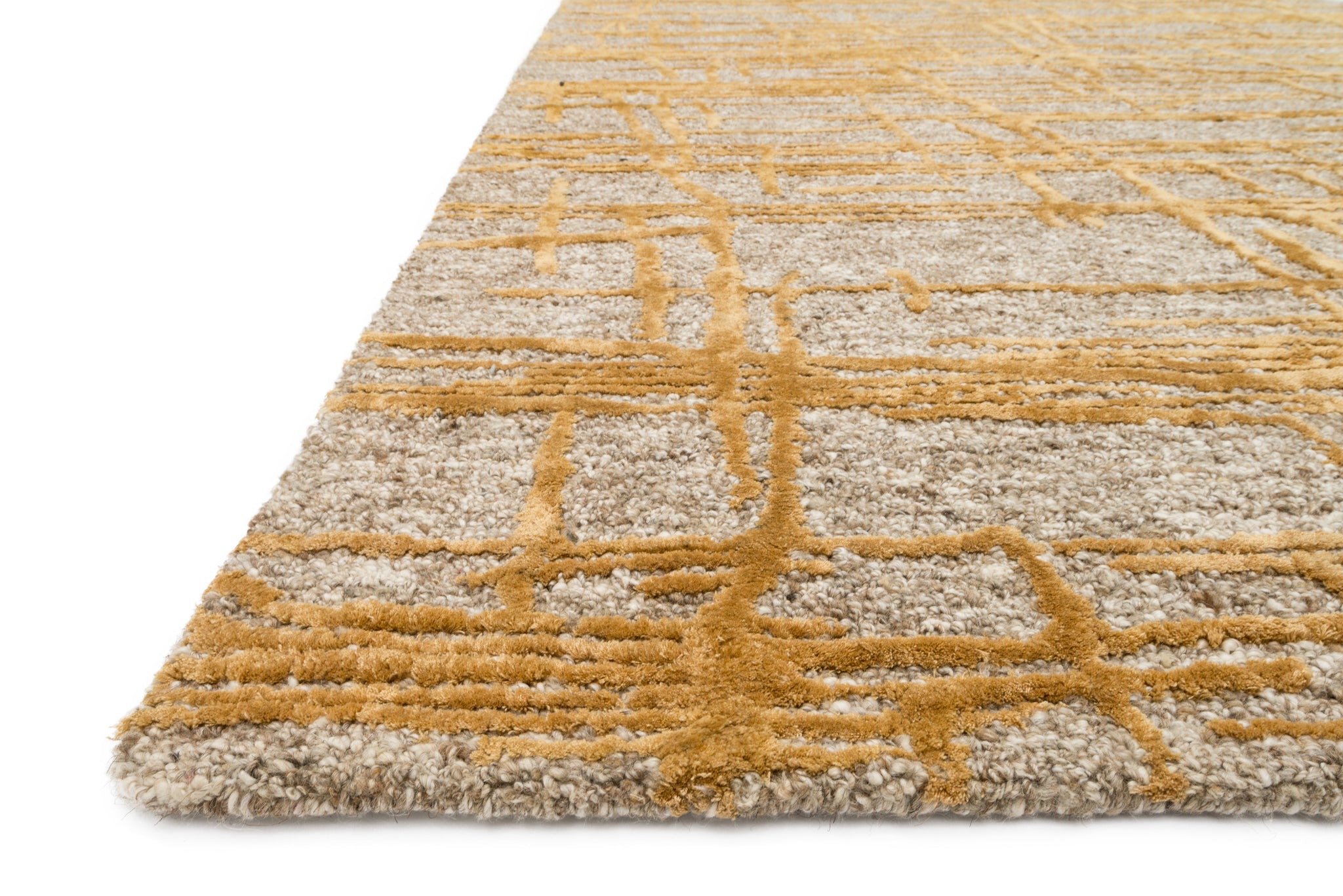 angle view of Juneau Natural / Gold luxury Rug