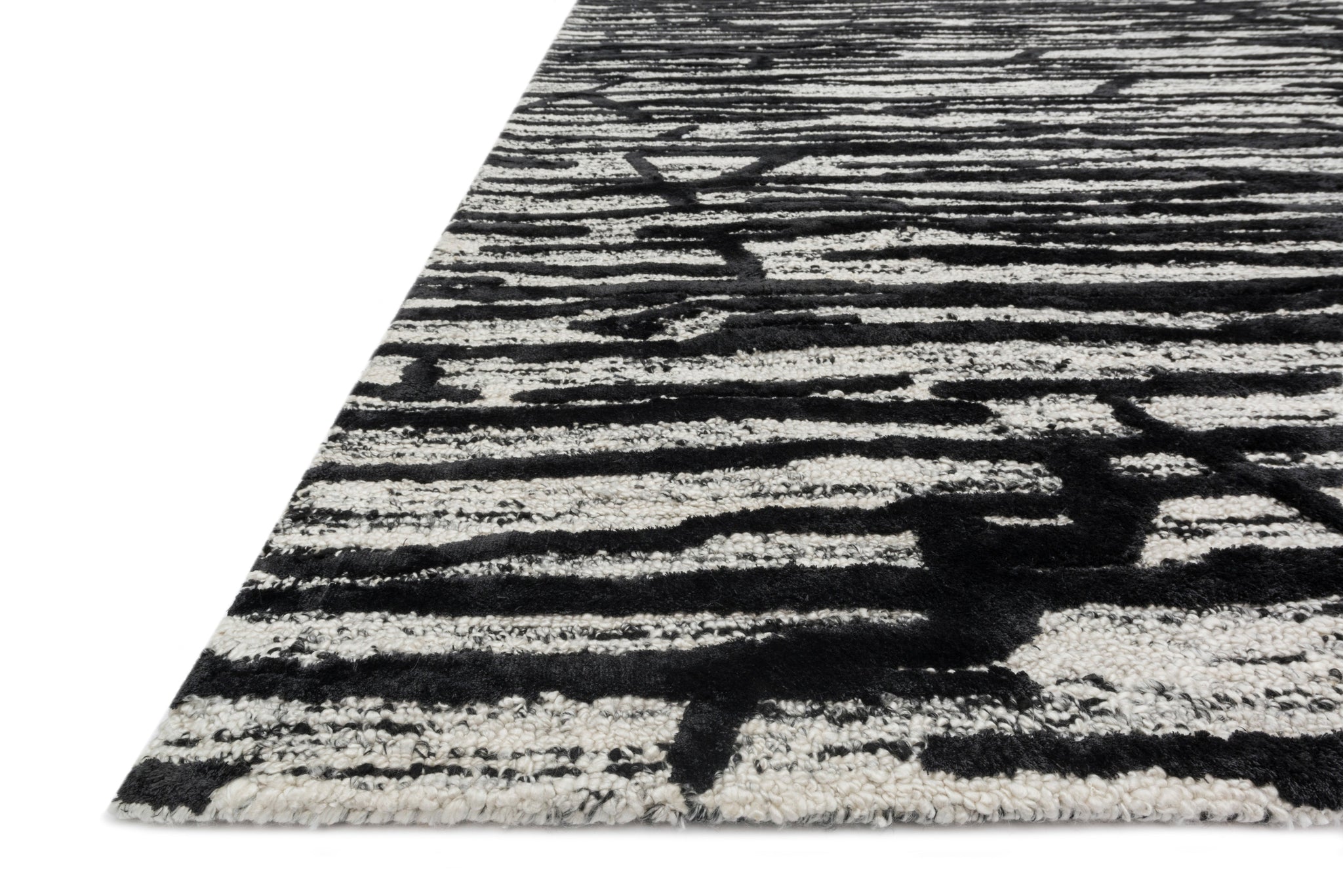 angle view of Juneau Ivory / Black luxury Rug