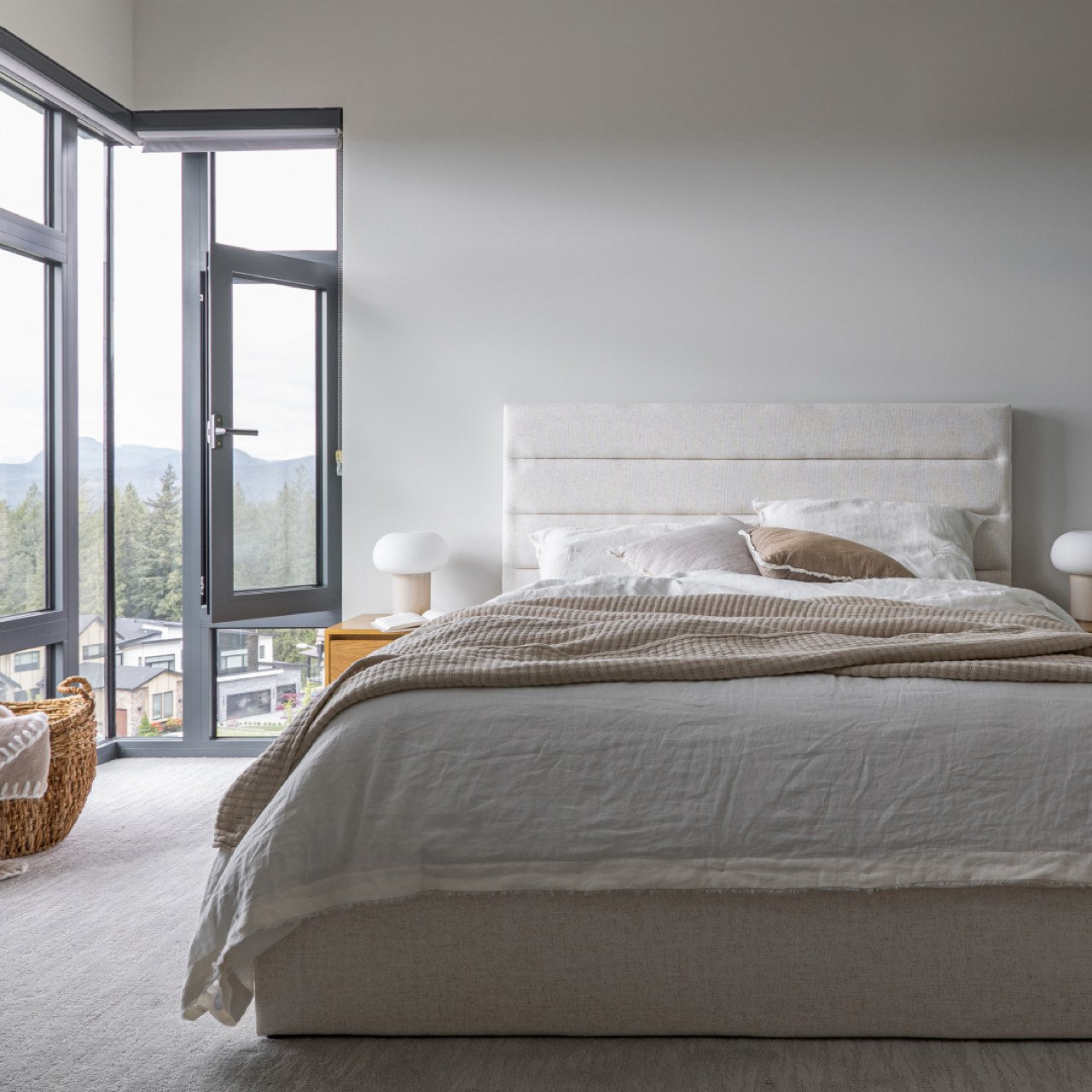 White bed with a white mattress on a white background