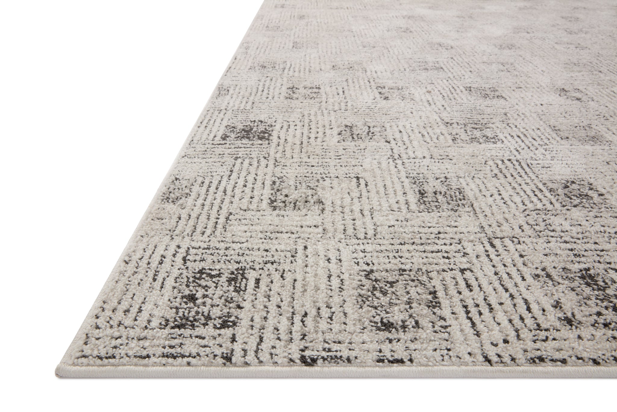 side view of Kamala Grey / Graphite luxury Rug