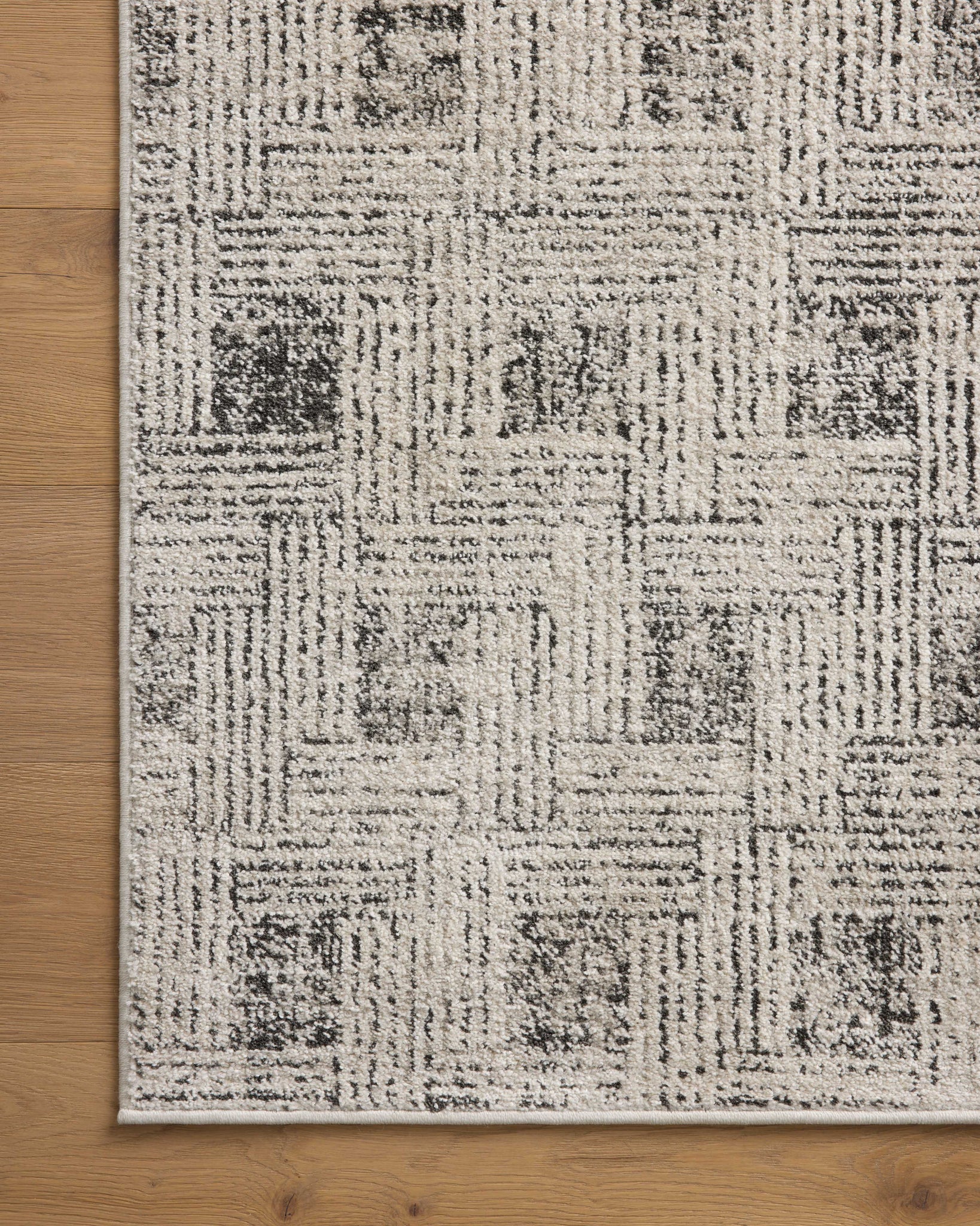 lifestyle view of Kamala Grey / Graphite luxury Rug