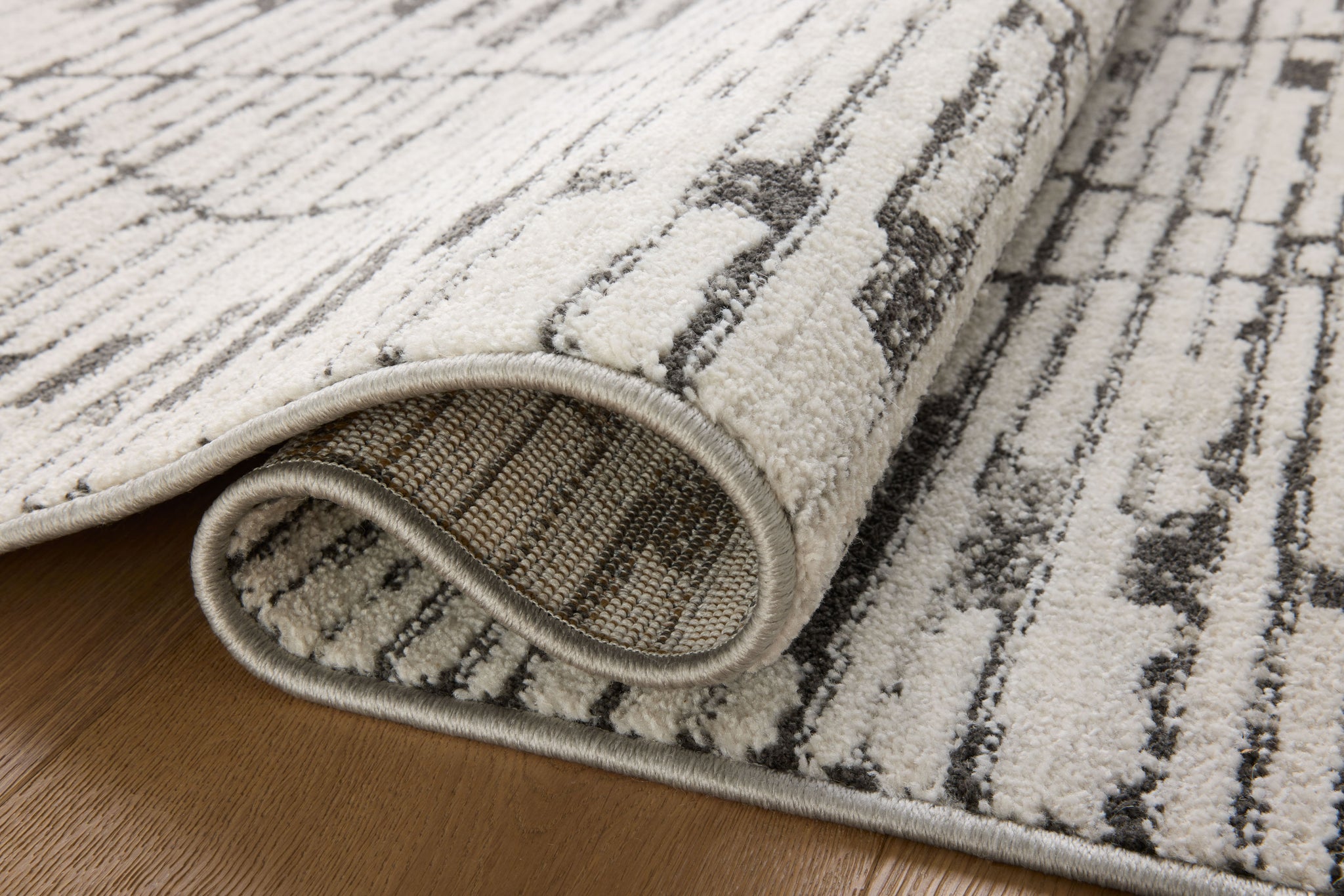 lifestyle view of Kamala Charcoal / Dove luxury Rug