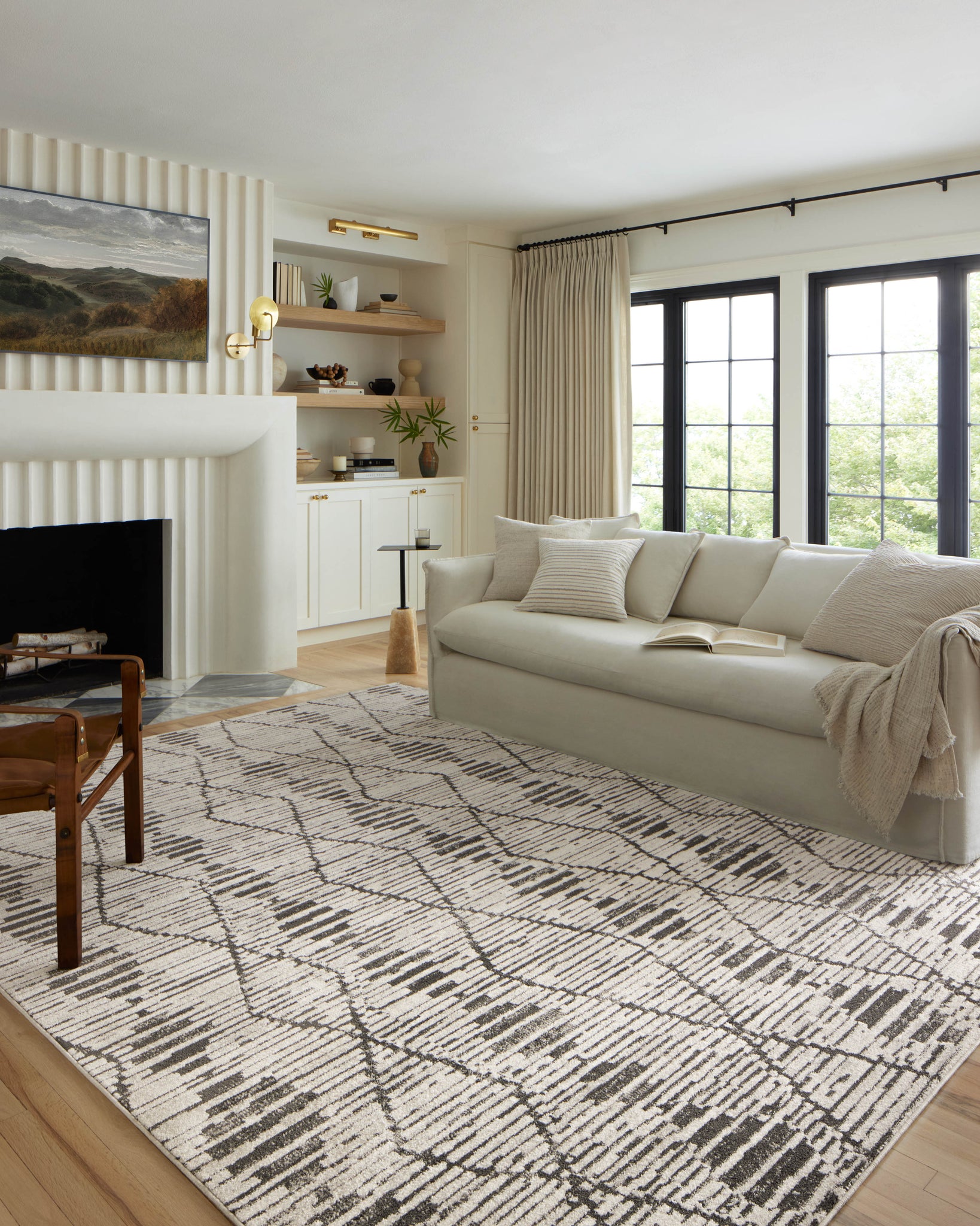 side view of Kamala Charcoal / Dove luxury Rug