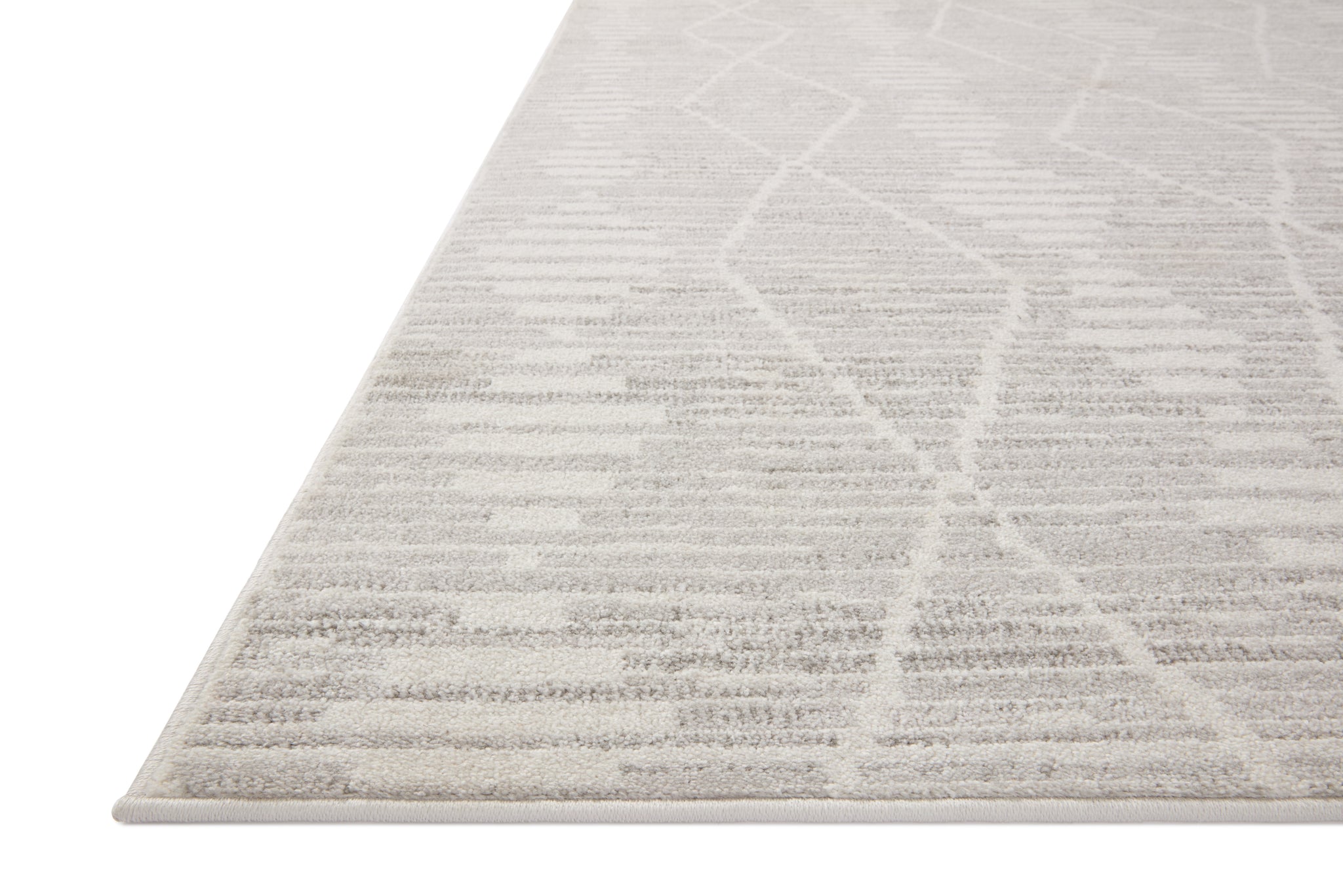 side view of Kamala Ivory / Silver luxury Rug