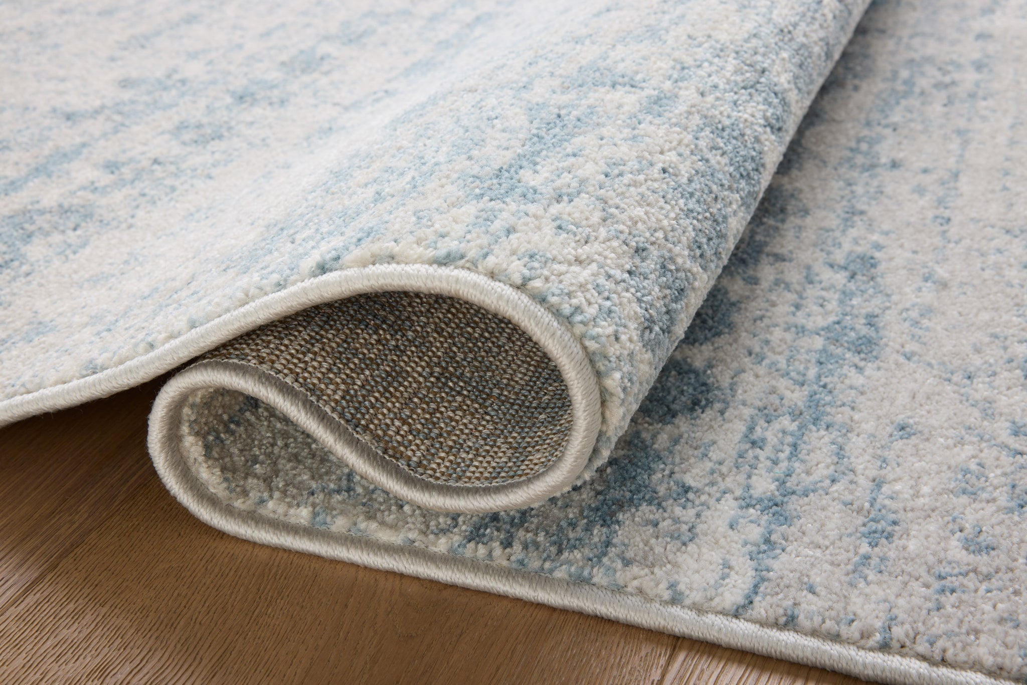 detail view of Kamala Sky / Dove luxury Rug