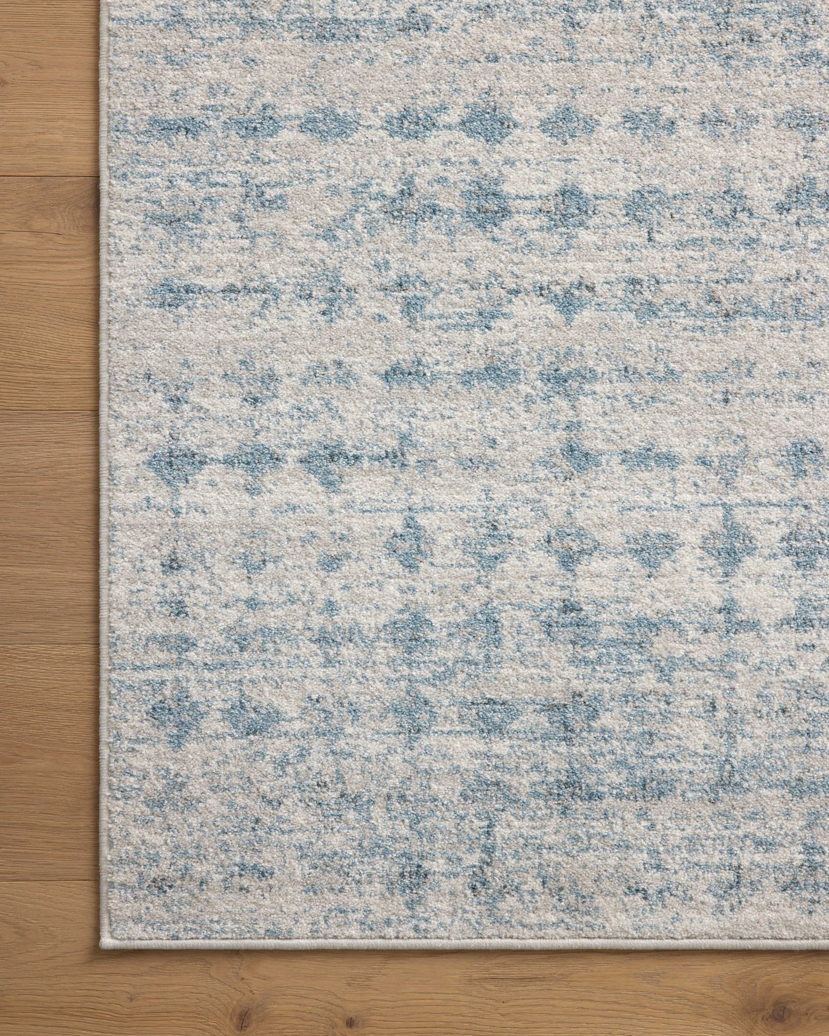 lifestyle view of Kamala Sky / Dove luxury Rug