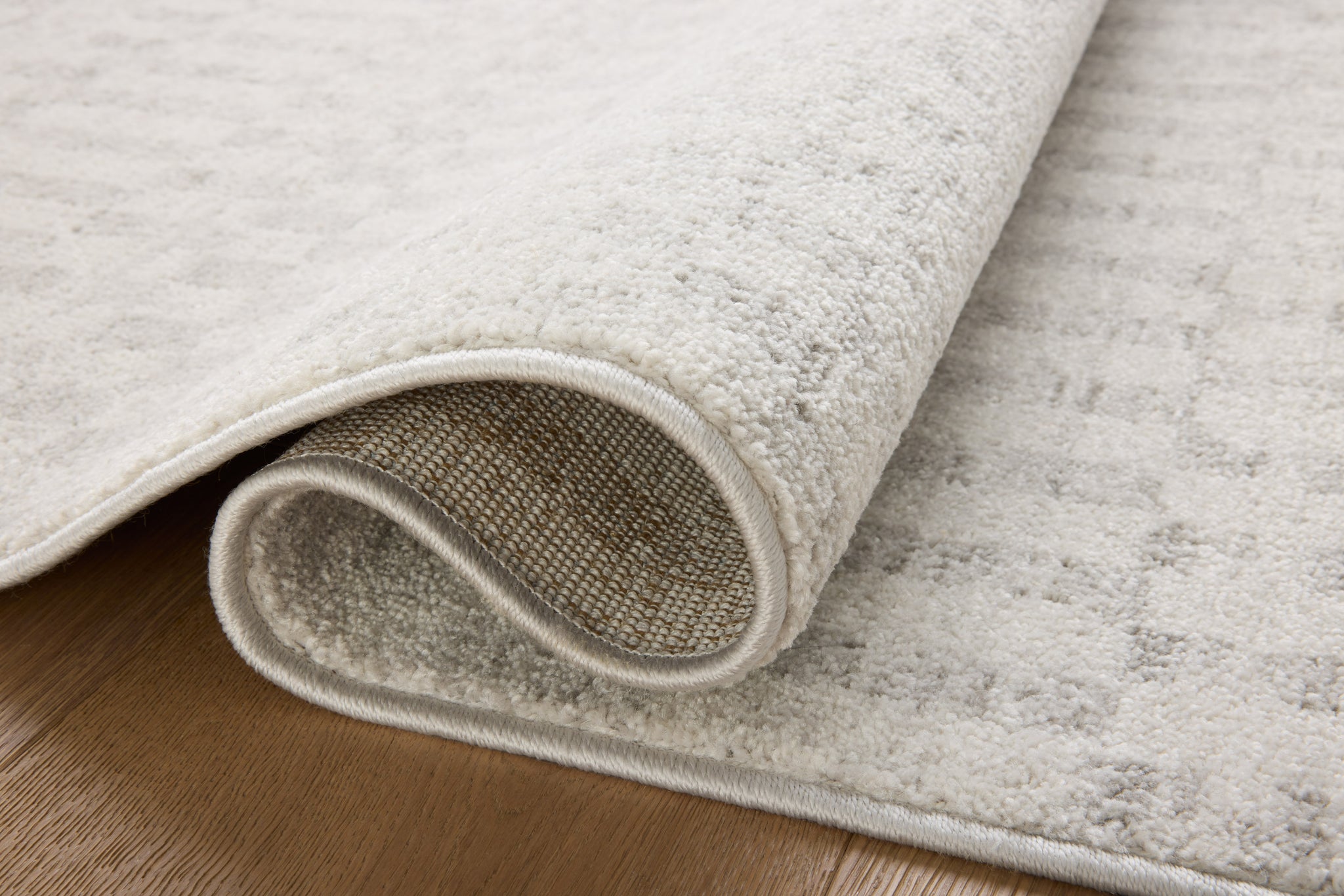 detail view of Kamala Ivory / Grey luxury Rug