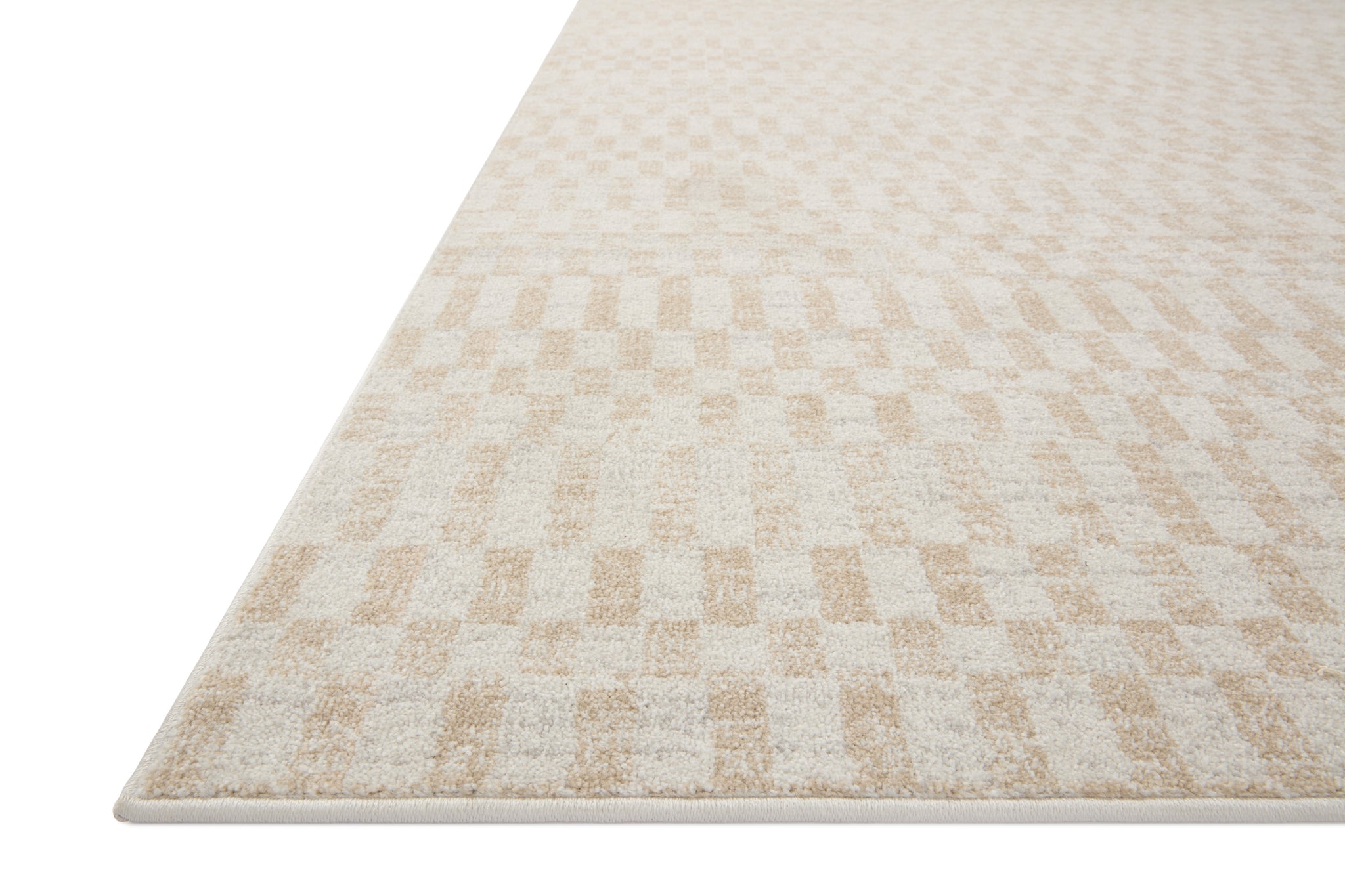 side view of Kamala Ivory / Natural luxury Rug