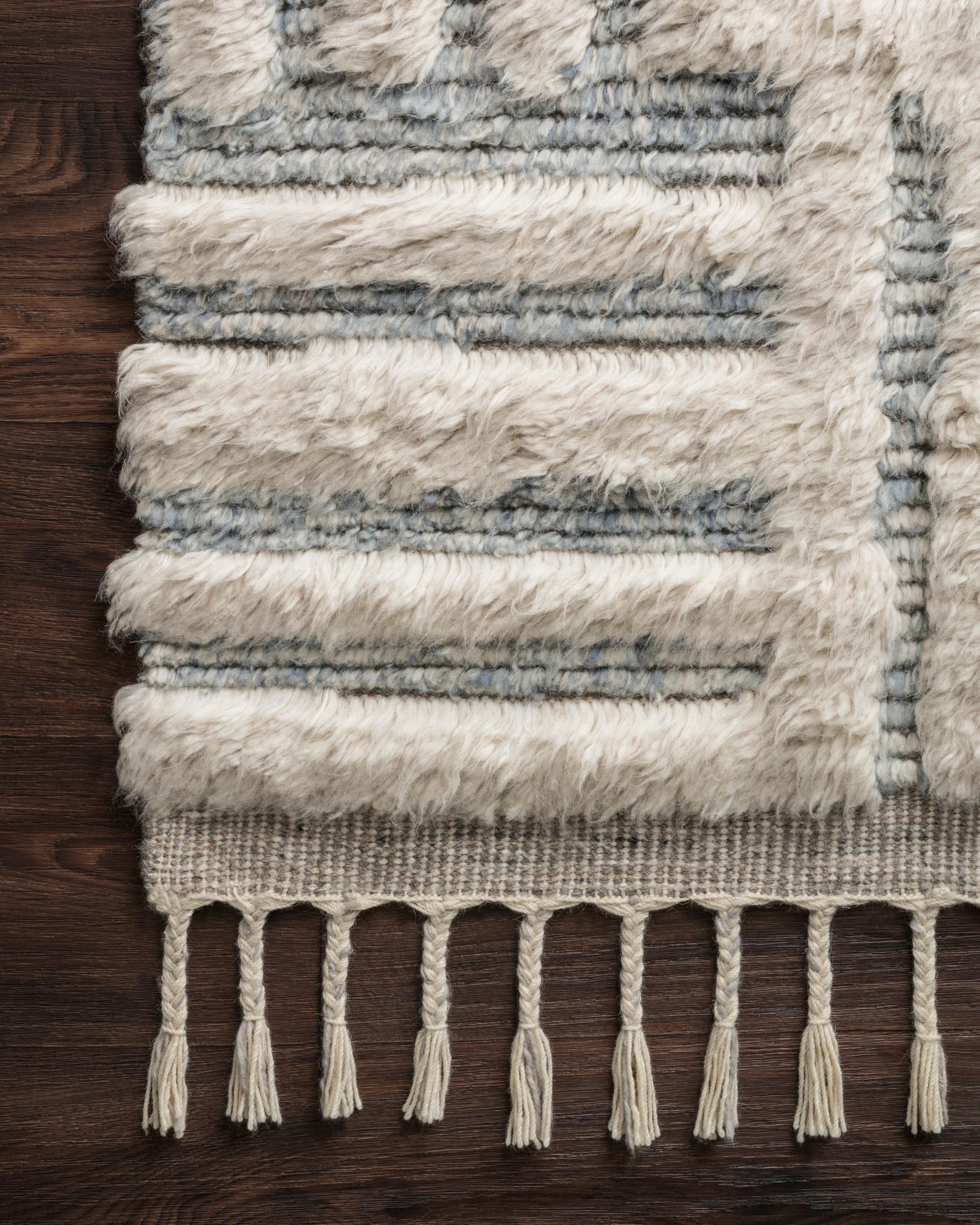 side view of Khalid Ivory / Sky luxury Rug
