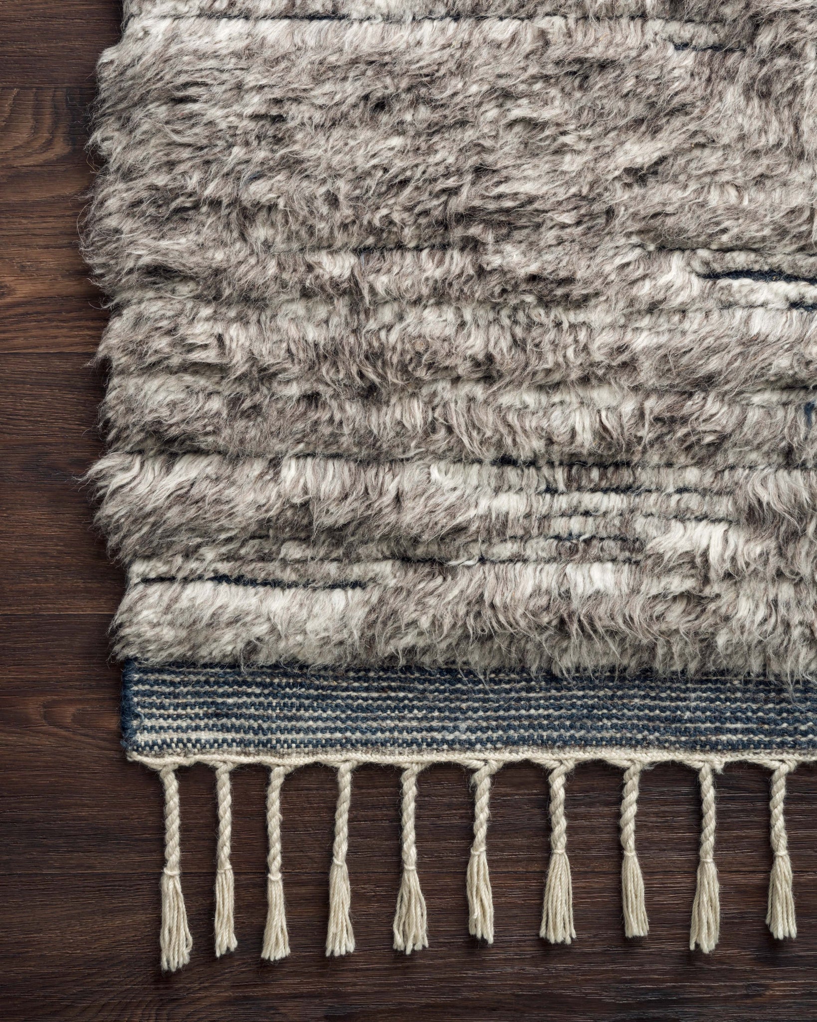 side view of Khalid Pewter / Ink luxury Rug