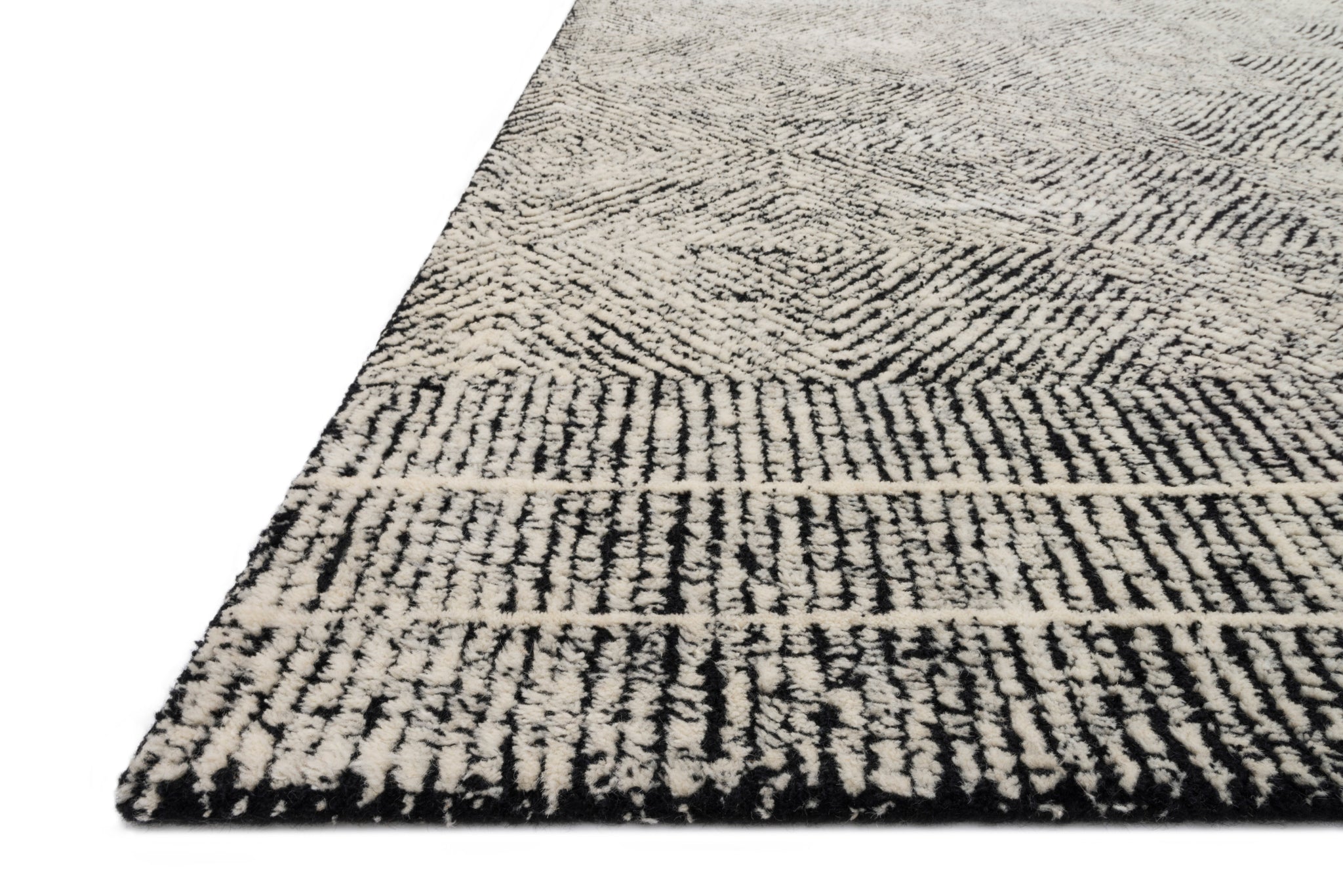 side view of Kopa Black / Ivory luxury Rug