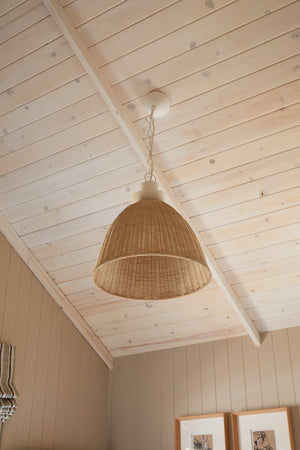 Kahn Pendant 22.25" styled in a welcoming entryway for warm, layered light at Laurie Yapp Home.