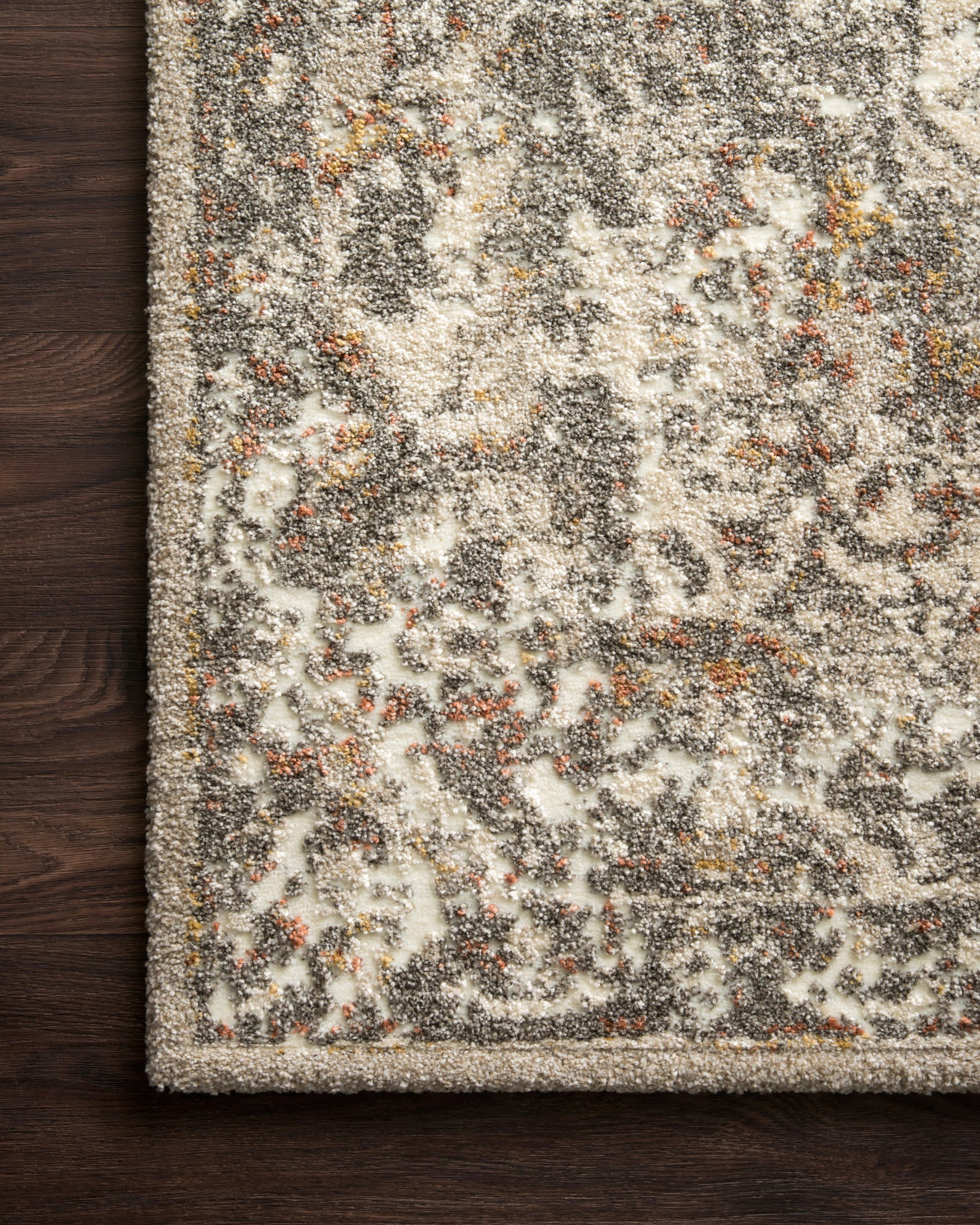 side view of Landscape Sand / Graphite luxury Rug