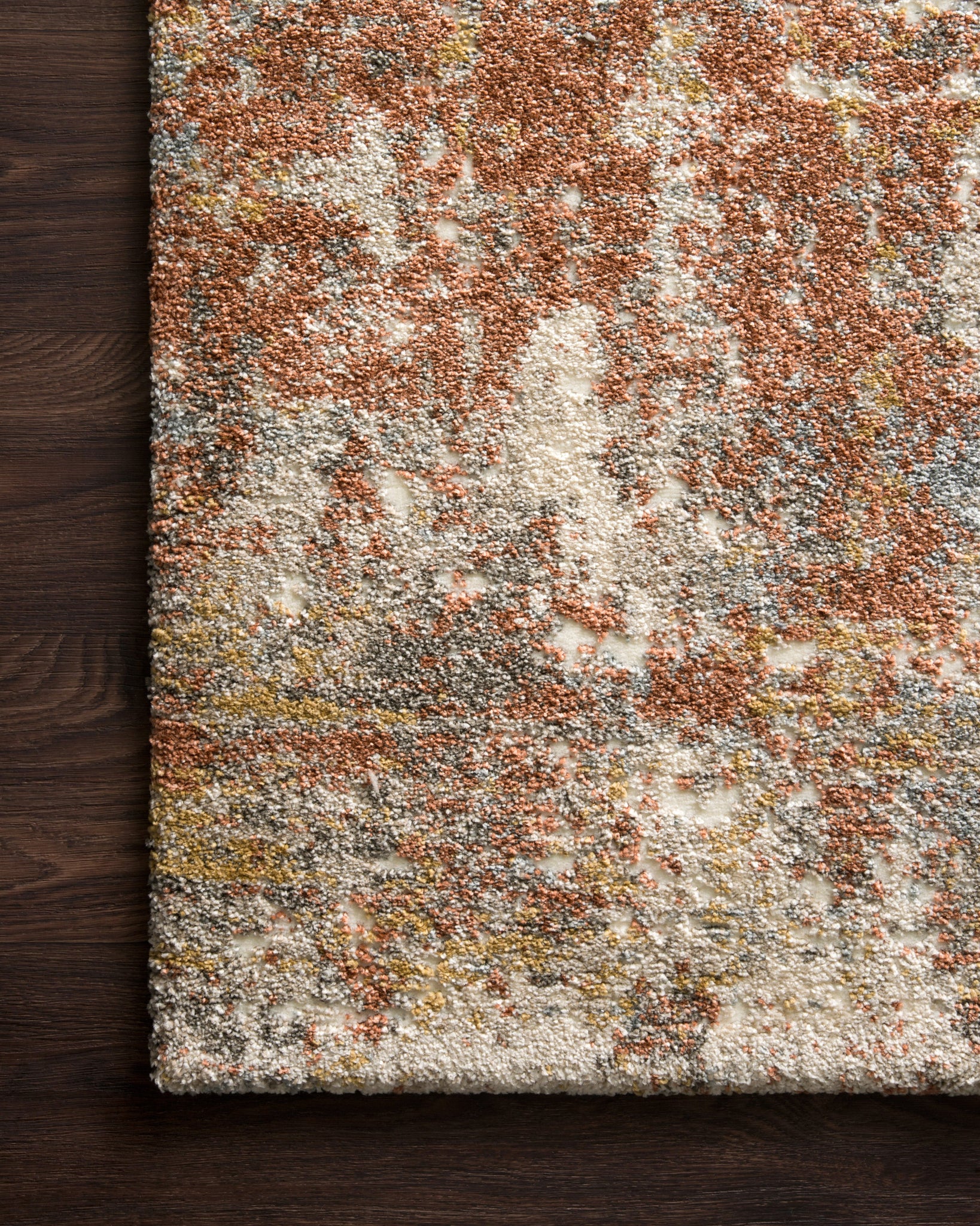 side view of Landscape Rust luxury Rug