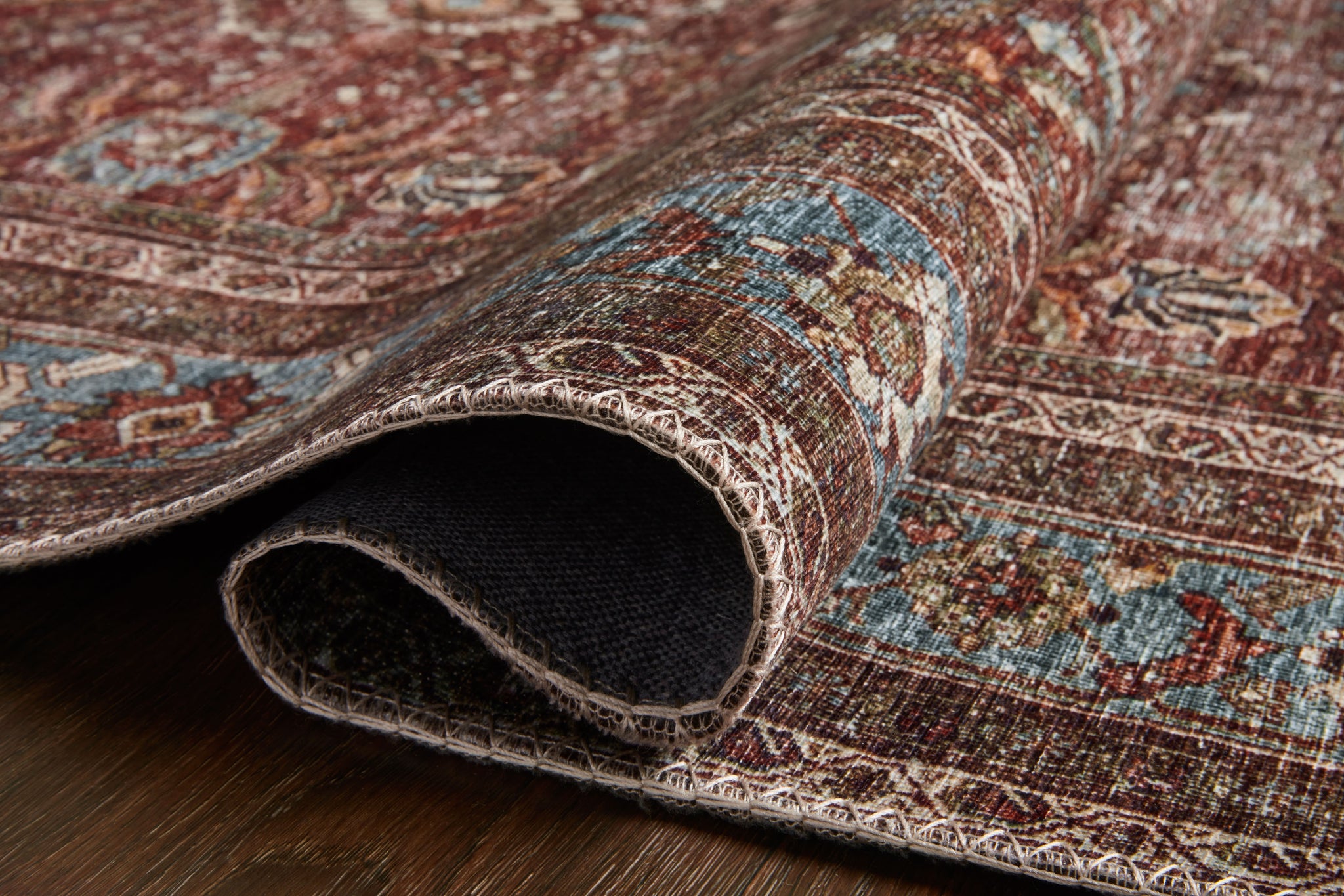 detail view of Layla Brick / Blue luxury Rug