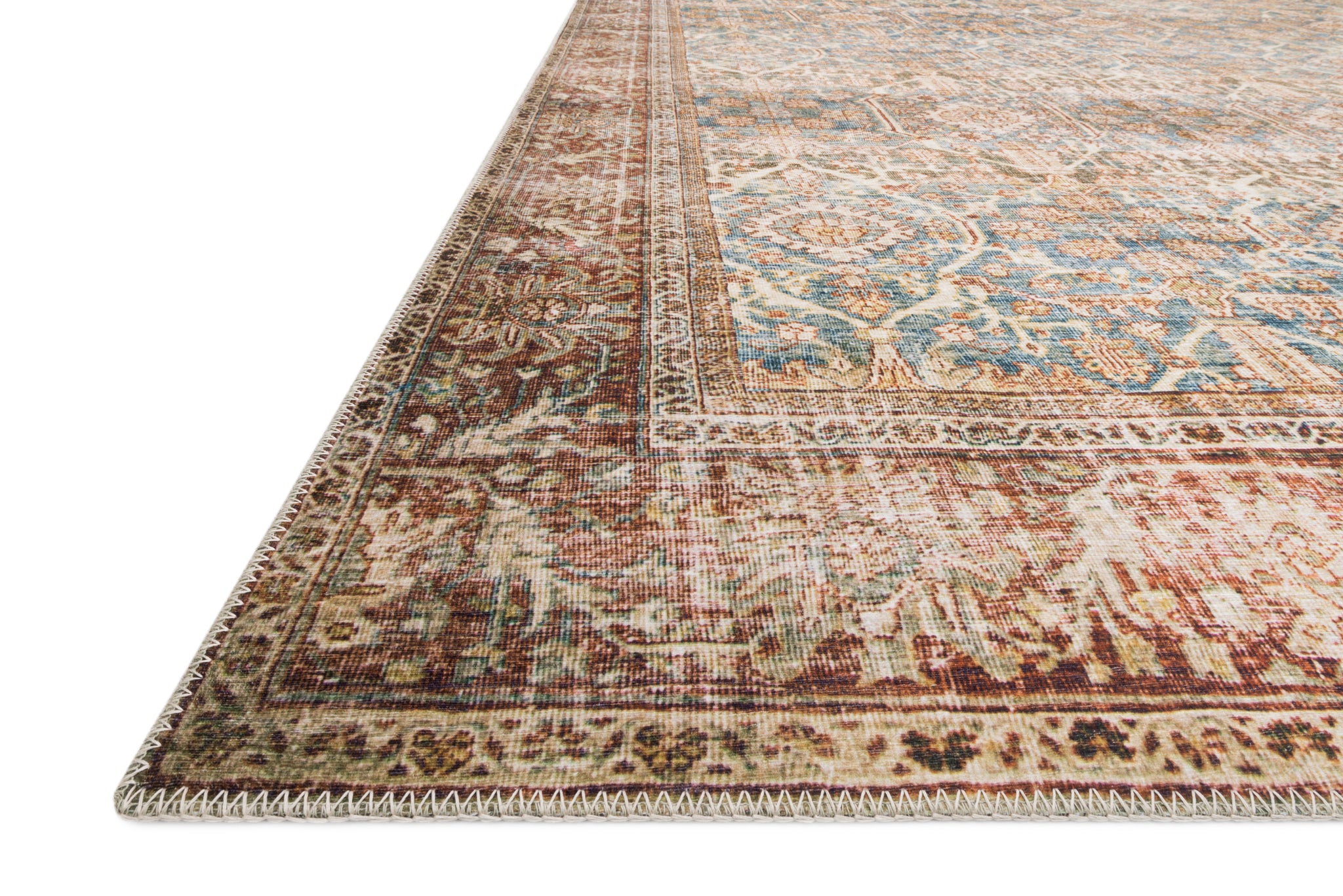 side view of Layla Ocean / Rust luxury Rug