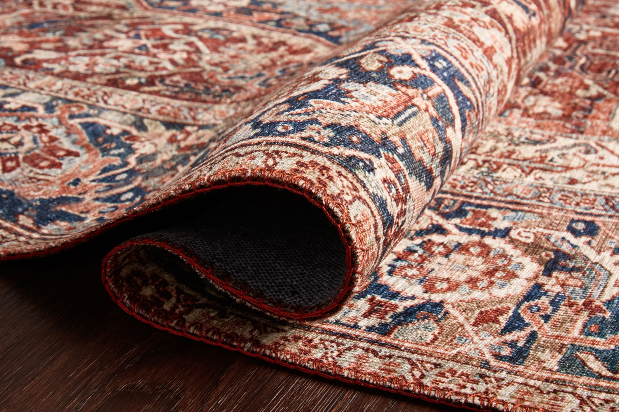 lifestyle view of Layla Red / Navy luxury Rug
