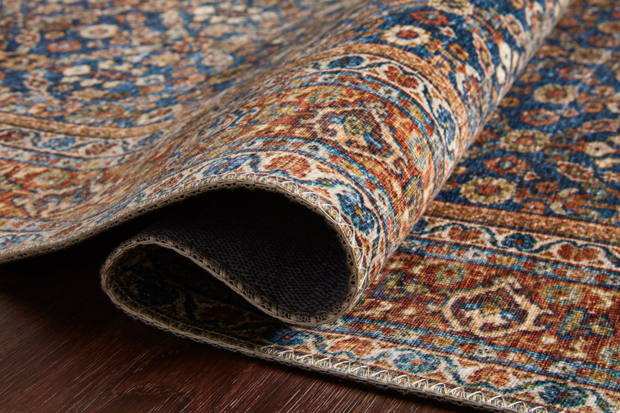lifestyle view of Layla Cobalt Blue / Spice luxury Rug