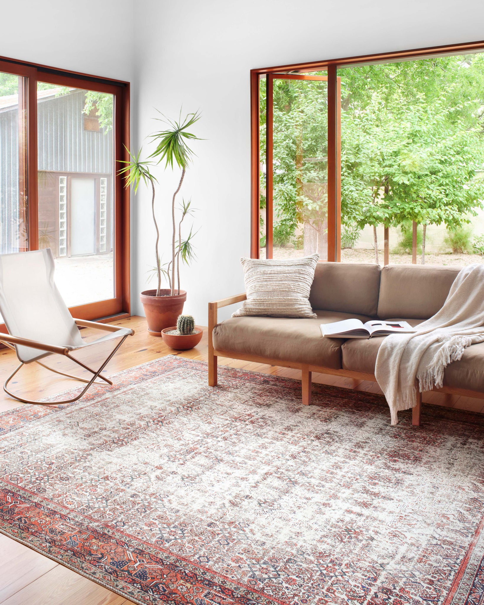 angle view of Layla Ivory / Brick luxury Rug