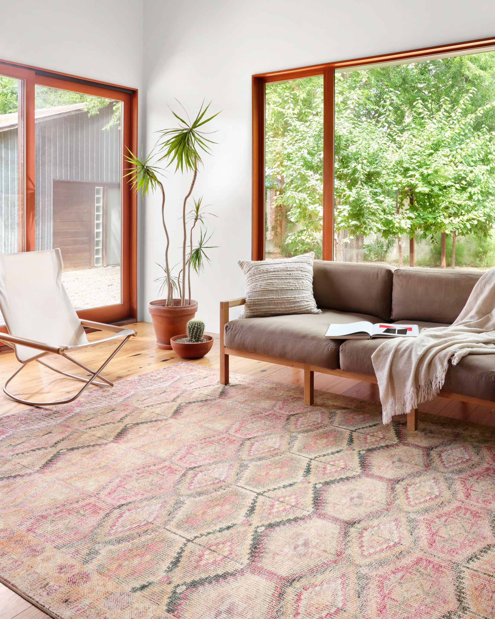 angle view of Layla Pink / Lagoon luxury Rug