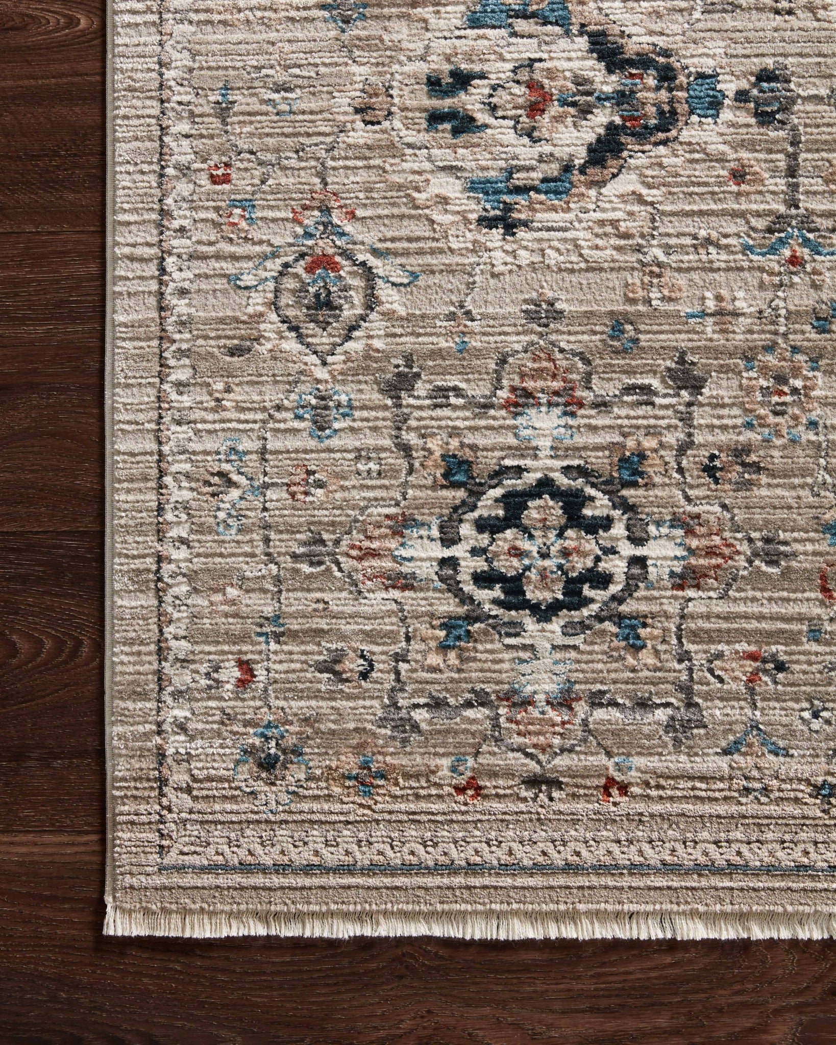 side view of Leigh Dove / Multi luxury Rug