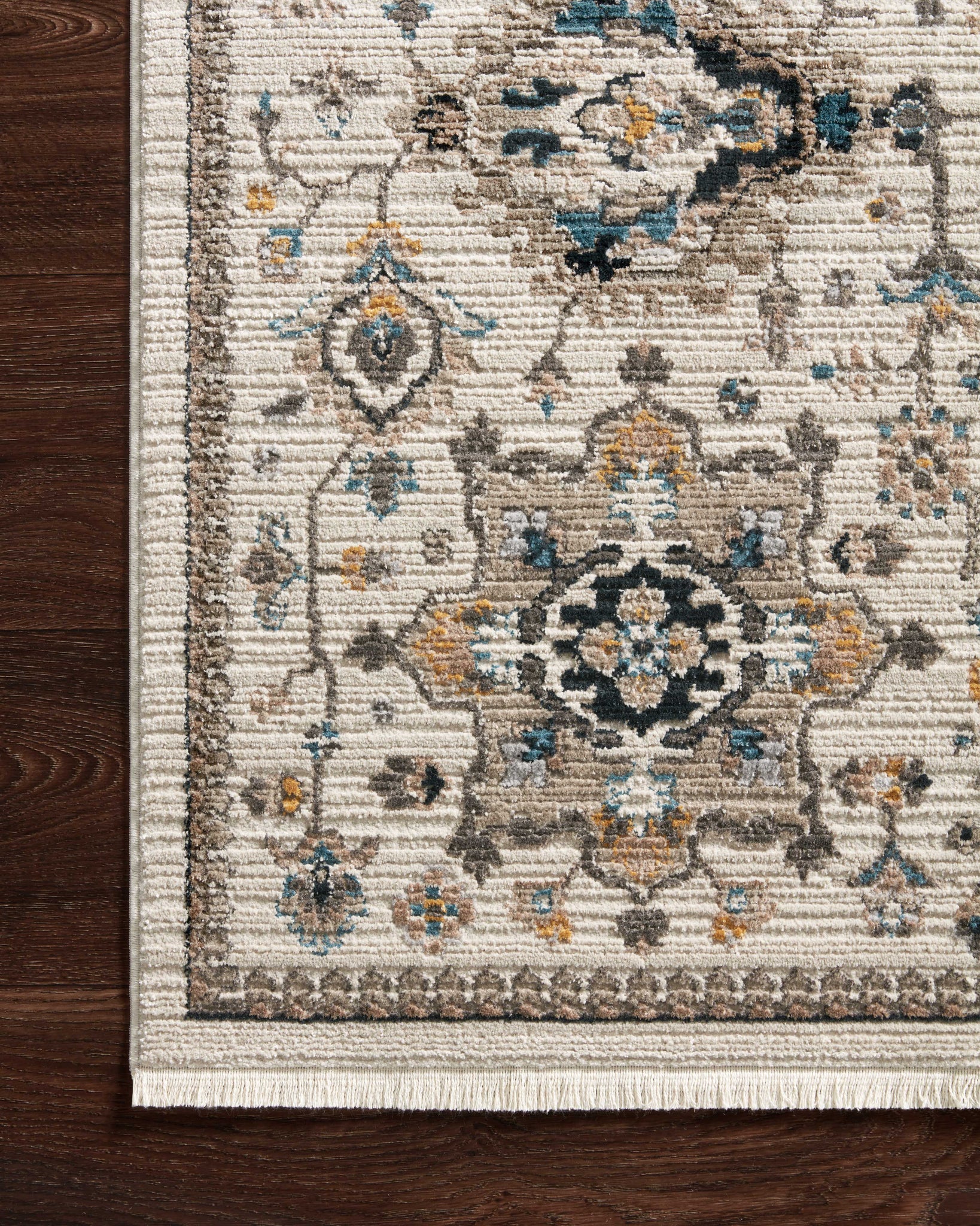 side view of Leigh Ivory / Taupe luxury Rug