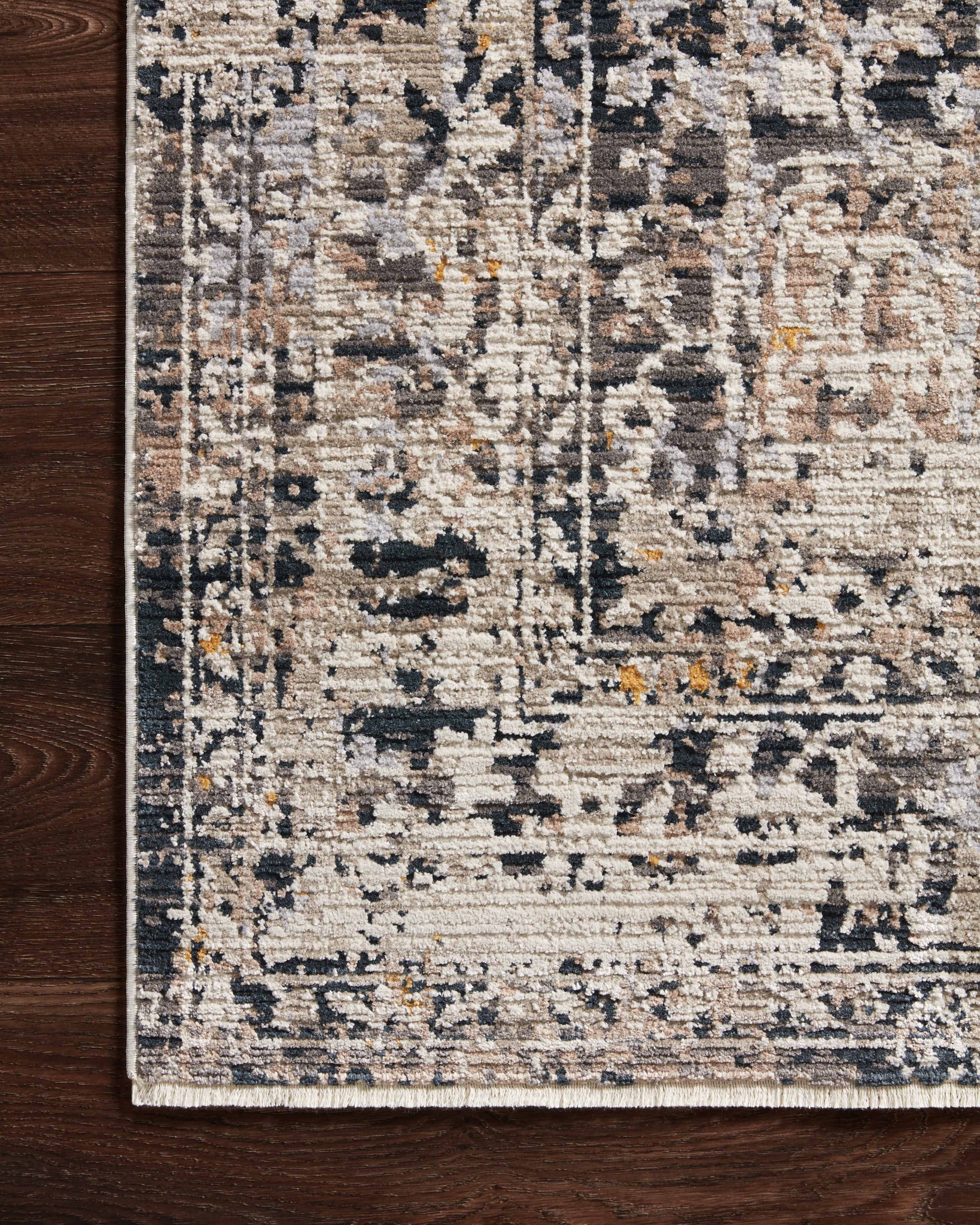 side view of Leigh Charcoal / Taupe luxury Rug
