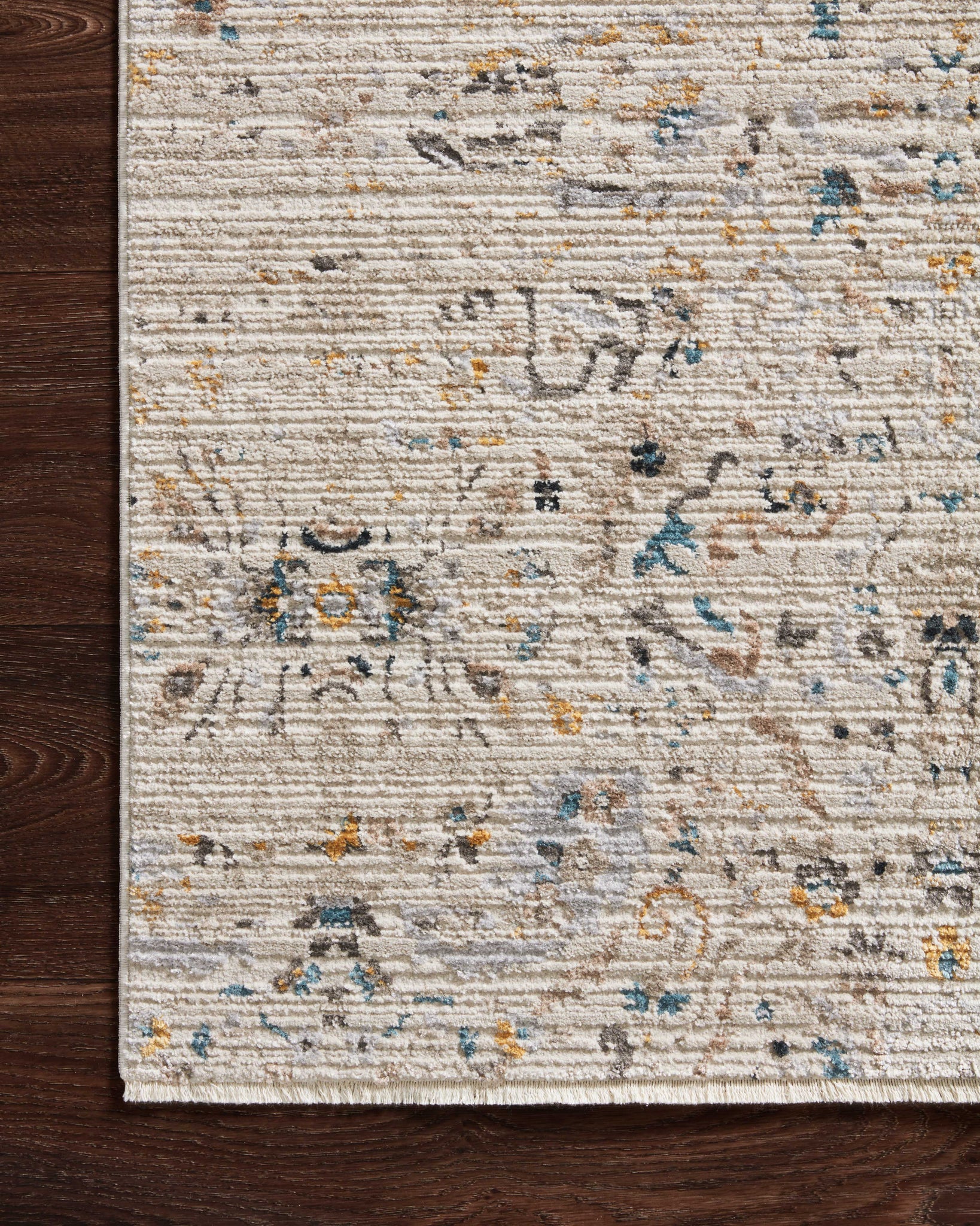side view of Leigh Ivory / Straw luxury Rug