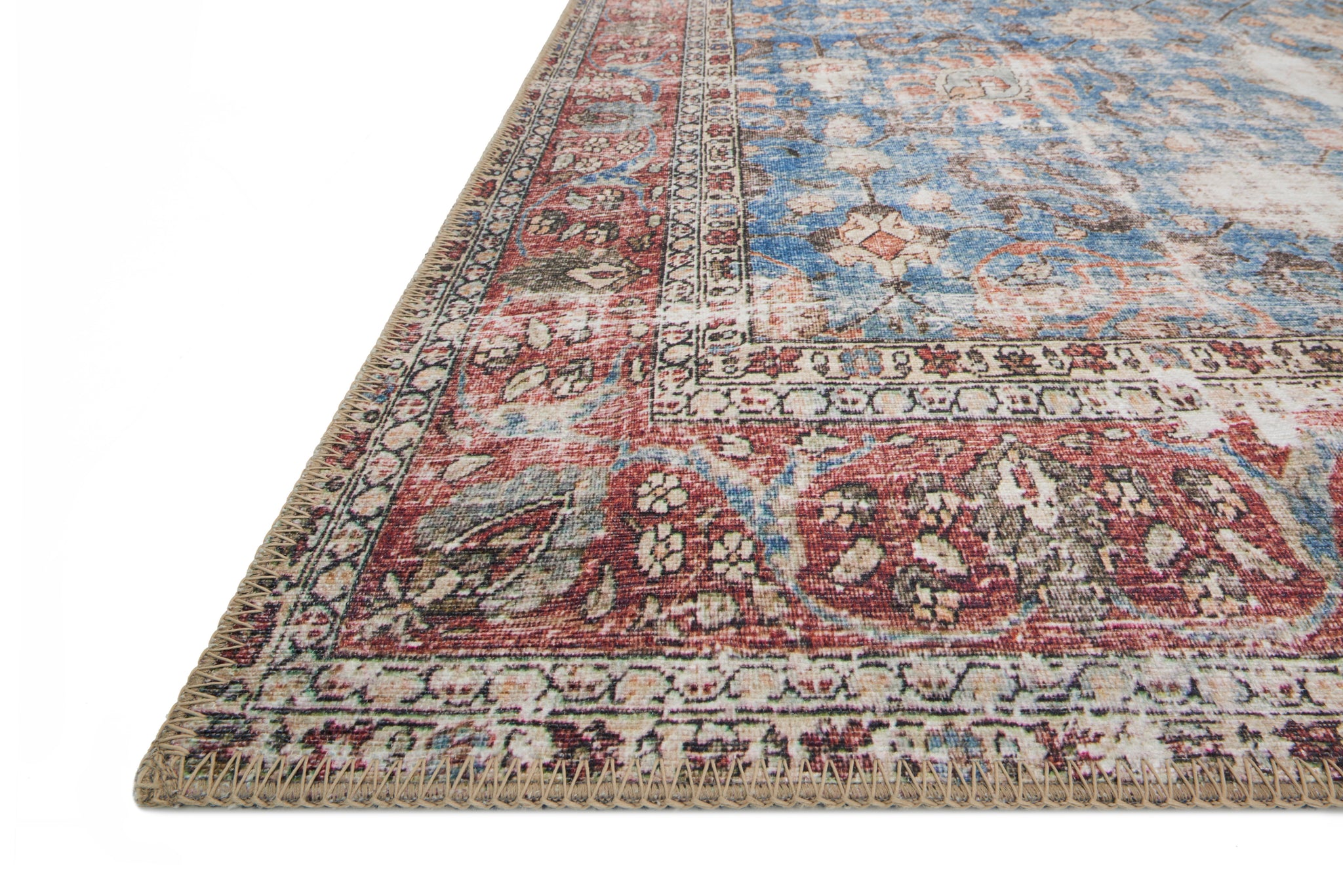 side view of Loren Blue / Brick luxury Rug