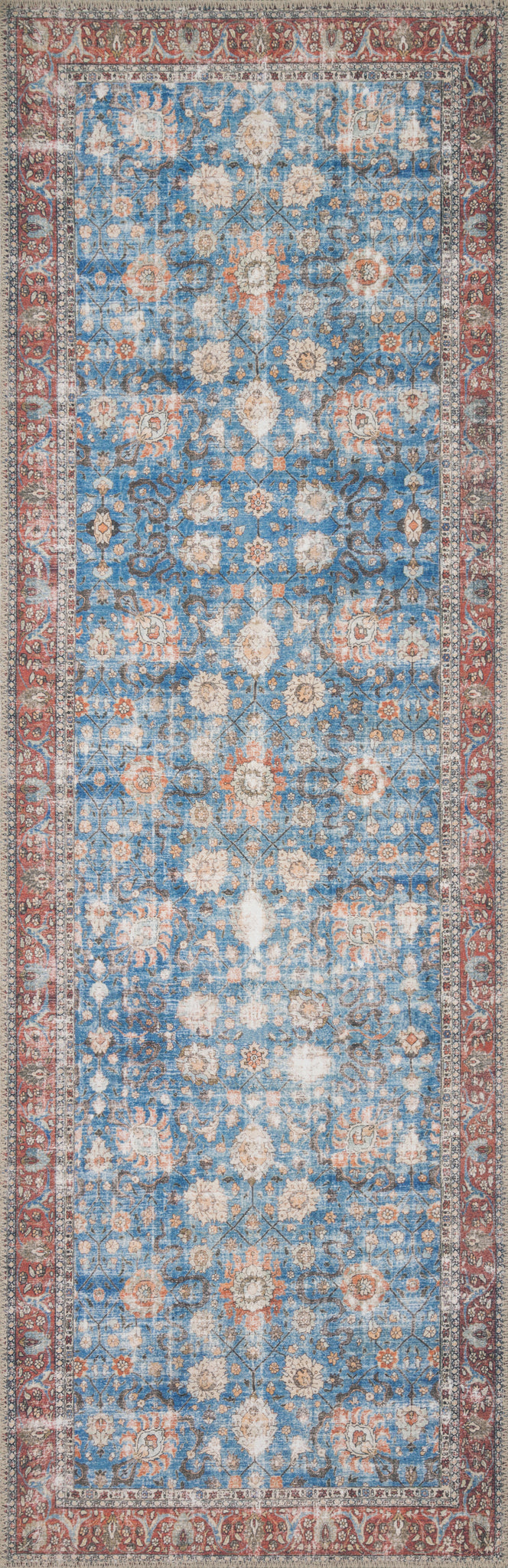 detail view of Loren Blue / Brick luxury Rug